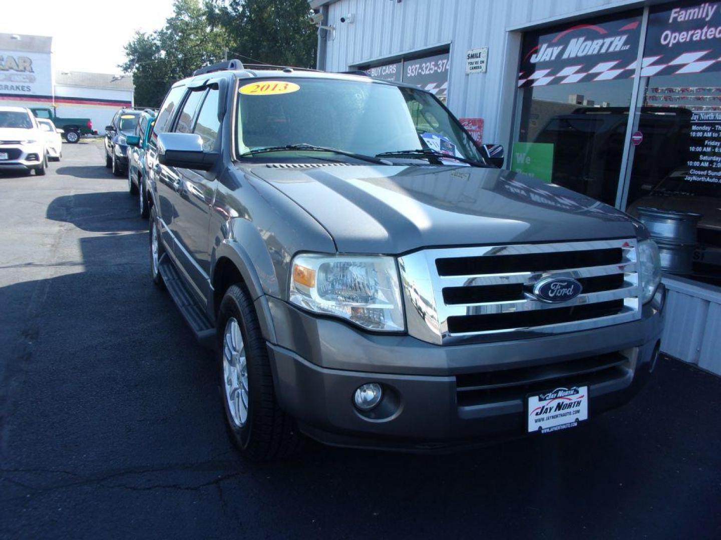 2013 GRAY FORD EXPEDITION XLT (1FMJU1H53DE) with an 5.4L engine, Automatic transmission, located at 501 E. Columbia St., Springfield, OH, 45503, (800) 262-7122, 39.925262, -83.801796 - *** New Tires *** 5.4L RWD *** 3RD Row Seating *** Serviced and Detailed ***( price reflects moonroof needs repaired to be used ) *** Jay North Auto has offered hand picked vehicles since 1965! Our customer's enjoy a NO pressure buying experience with a small town feel. All of our vehicles get - Photo#1