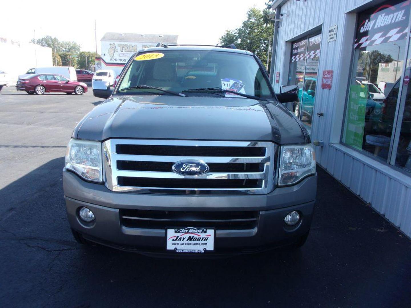 2013 GRAY FORD EXPEDITION XLT (1FMJU1H53DE) with an 5.4L engine, Automatic transmission, located at 501 E. Columbia St., Springfield, OH, 45503, (800) 262-7122, 39.925262, -83.801796 - *** New Tires *** 5.4L RWD *** 3RD Row Seating *** Serviced and Detailed ***( price reflects moonroof needs repaired to be used ) *** Jay North Auto has offered hand picked vehicles since 1965! Our customer's enjoy a NO pressure buying experience with a small town feel. All of our vehicles get - Photo#2