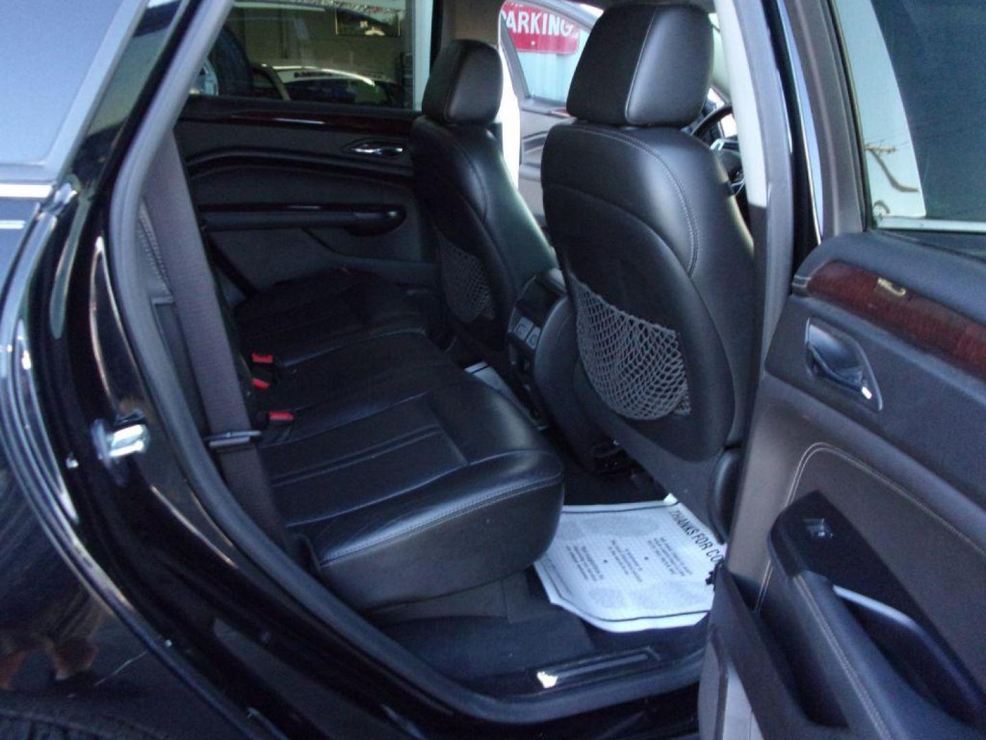 2016 BLACK CADILLAC SRX LUXURY COLLECTION (3GYFNEE32GS) with an 3.6L engine, Automatic transmission, located at 501 E. Columbia St., Springfield, OH, 45503, (800) 262-7122, 39.925262, -83.801796 - *** Luxury Collection *** Panoramic Moonroof *** Bose Audio with Back Up Camera *** Power Lift Gate *** V6 AWD *** Serviced and Detailed *** Remote Start *** New Headlight Housings *** Jay North Auto has offered hand picked vehicles since 1965! Our customer's enjoy a NO pressure buying experienc - Photo#10