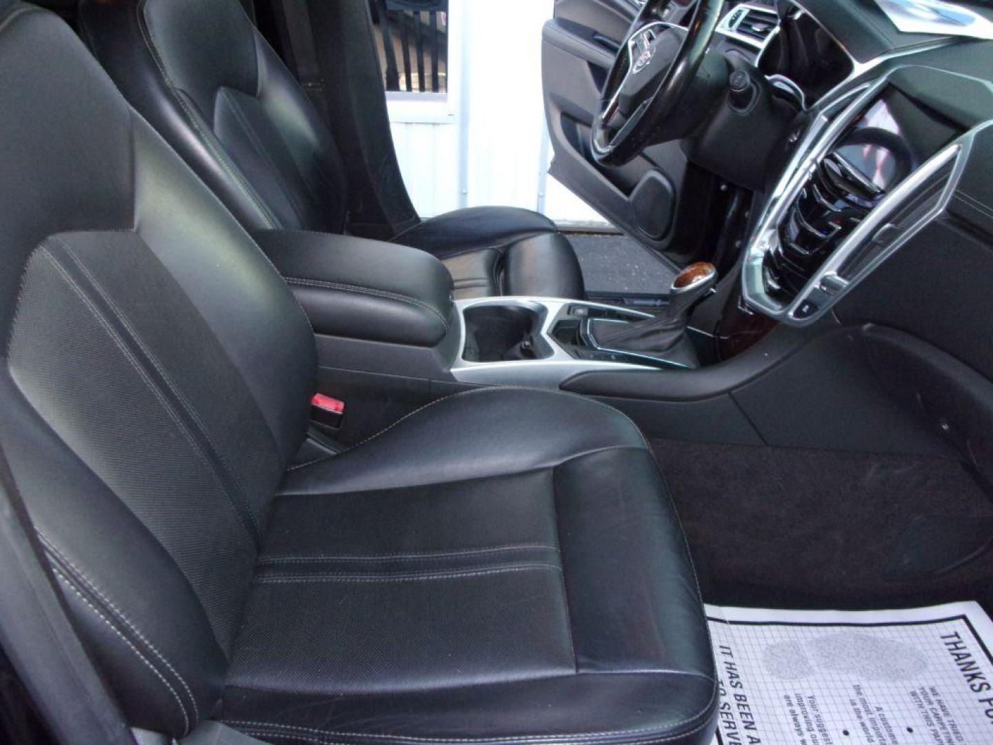 2016 BLACK CADILLAC SRX LUXURY COLLECTION (3GYFNEE32GS) with an 3.6L engine, Automatic transmission, located at 501 E. Columbia St., Springfield, OH, 45503, (800) 262-7122, 39.925262, -83.801796 - *** Luxury Collection *** Panoramic Moonroof *** Bose Audio with Back Up Camera *** Power Lift Gate *** V6 AWD *** Serviced and Detailed *** Remote Start *** New Headlight Housings *** Jay North Auto has offered hand picked vehicles since 1965! Our customer's enjoy a NO pressure buying experienc - Photo#13