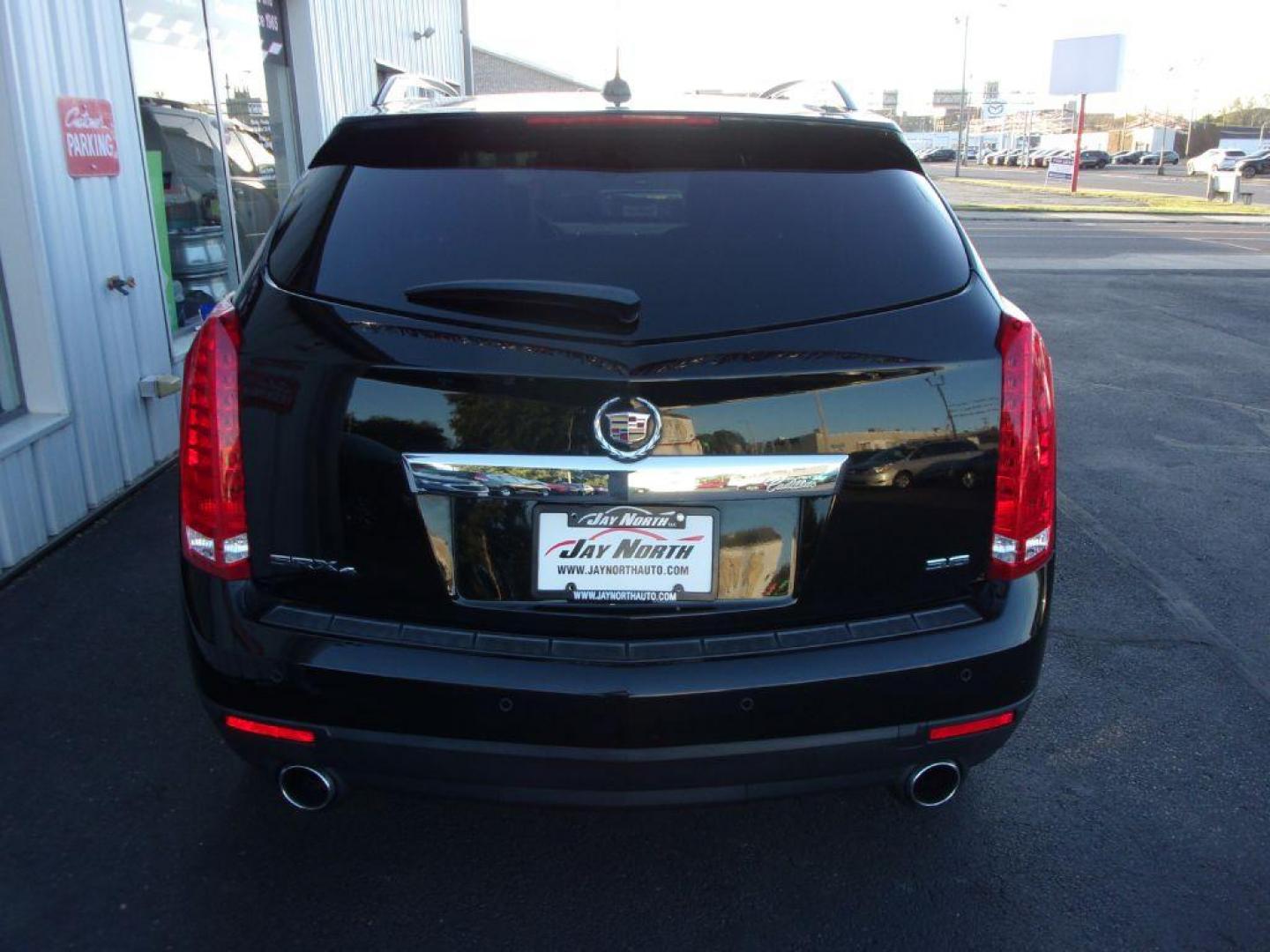 2016 BLACK CADILLAC SRX LUXURY COLLECTION (3GYFNEE32GS) with an 3.6L engine, Automatic transmission, located at 501 E. Columbia St., Springfield, OH, 45503, (800) 262-7122, 39.925262, -83.801796 - *** Luxury Collection *** Panoramic Moonroof *** Bose Audio with Back Up Camera *** Power Lift Gate *** V6 AWD *** Serviced and Detailed *** Remote Start *** New Headlight Housings *** Jay North Auto has offered hand picked vehicles since 1965! Our customer's enjoy a NO pressure buying experienc - Photo#2
