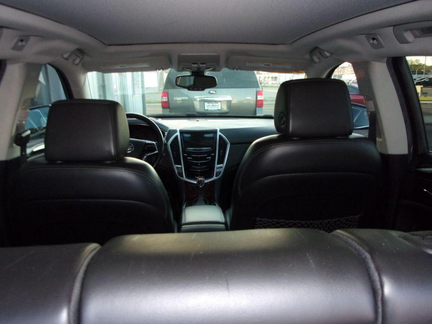 2016 BLACK CADILLAC SRX LUXURY COLLECTION (3GYFNEE32GS) with an 3.6L engine, Automatic transmission, located at 501 E. Columbia St., Springfield, OH, 45503, (800) 262-7122, 39.925262, -83.801796 - *** Luxury Collection *** Panoramic Moonroof *** Bose Audio with Back Up Camera *** Power Lift Gate *** V6 AWD *** Serviced and Detailed *** Remote Start *** New Headlight Housings *** Jay North Auto has offered hand picked vehicles since 1965! Our customer's enjoy a NO pressure buying experienc - Photo#3