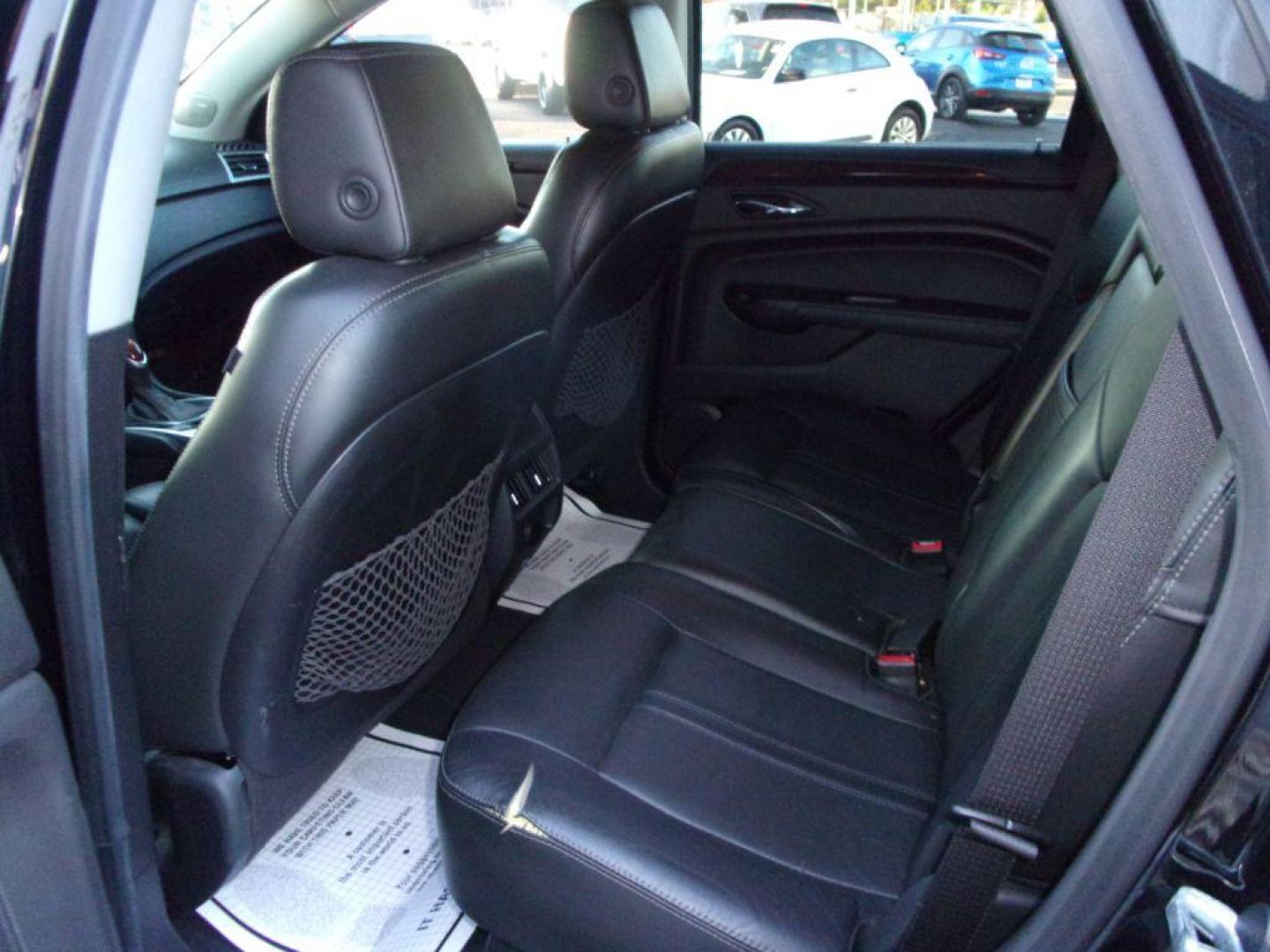 2016 BLACK CADILLAC SRX LUXURY COLLECTION (3GYFNEE32GS) with an 3.6L engine, Automatic transmission, located at 501 E. Columbia St., Springfield, OH, 45503, (800) 262-7122, 39.925262, -83.801796 - *** Luxury Collection *** Panoramic Moonroof *** Bose Audio with Back Up Camera *** Power Lift Gate *** V6 AWD *** Serviced and Detailed *** Remote Start *** New Headlight Housings *** Jay North Auto has offered hand picked vehicles since 1965! Our customer's enjoy a NO pressure buying experienc - Photo#4