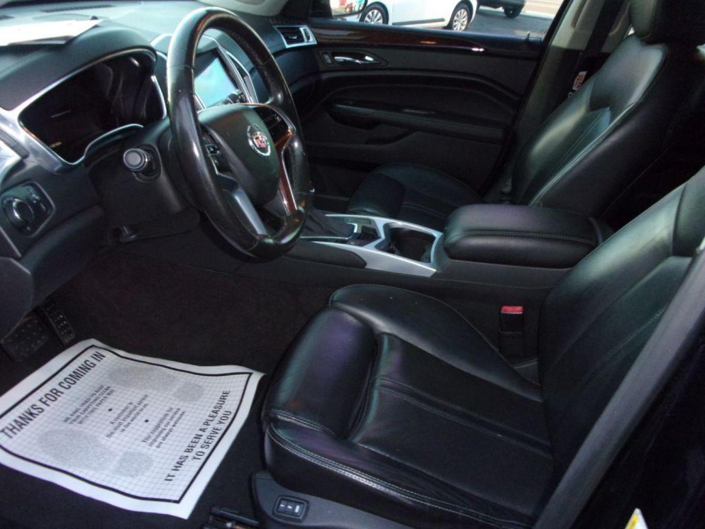 2016 BLACK CADILLAC SRX LUXURY COLLECTION (3GYFNEE32GS) with an 3.6L engine, Automatic transmission, located at 501 E. Columbia St., Springfield, OH, 45503, (800) 262-7122, 39.925262, -83.801796 - *** Luxury Collection *** Panoramic Moonroof *** Bose Audio with Back Up Camera *** Power Lift Gate *** V6 AWD *** Serviced and Detailed *** Remote Start *** New Headlight Housings *** Jay North Auto has offered hand picked vehicles since 1965! Our customer's enjoy a NO pressure buying experienc - Photo#8