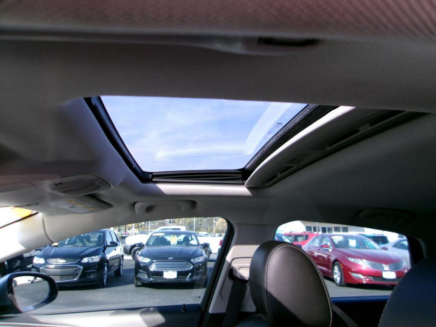 2013 SILVER BUICK VERANO LEATHER (1G4PS5SK0D4) with an 2.4L engine, Automatic transmission, located at 501 E. Columbia St., Springfield, OH, 45503, (800) 262-7122, 39.925262, -83.801796 - Photo#9