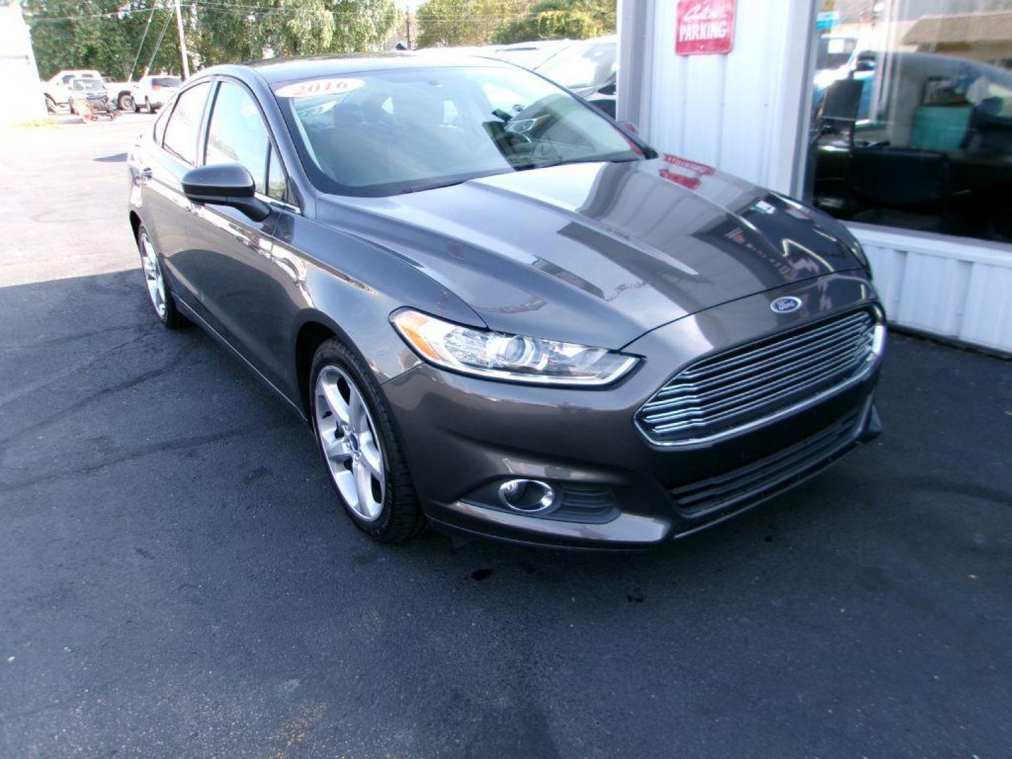2016 GRAY FORD FUSION S (3FA6P0G75GR) with an 2.5L engine, Automatic transmission, located at 501 E. Columbia St., Springfield, OH, 45503, (800) 262-7122, 39.925262, -83.801796 - Photo#2