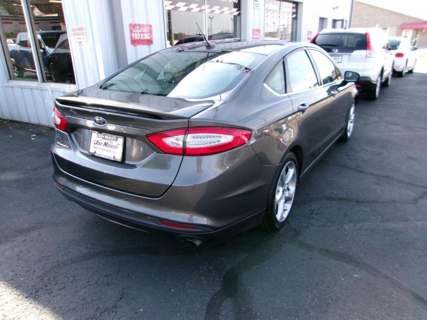 2016 GRAY FORD FUSION S (3FA6P0G75GR) with an 2.5L engine, Automatic transmission, located at 501 E. Columbia St., Springfield, OH, 45503, (800) 262-7122, 39.925262, -83.801796 - Photo#3