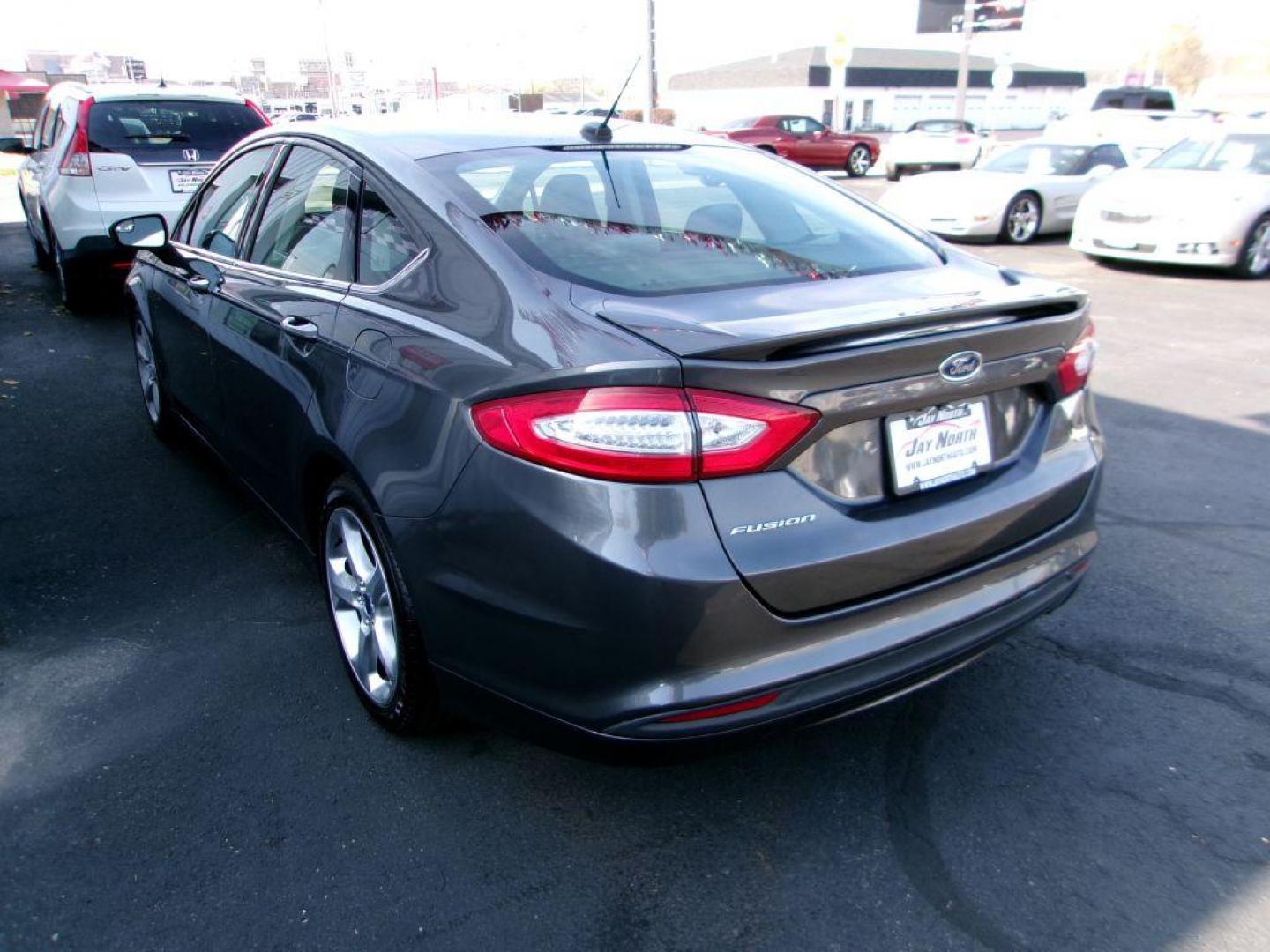 2016 GRAY FORD FUSION S (3FA6P0G75GR) with an 2.5L engine, Automatic transmission, located at 501 E. Columbia St., Springfield, OH, 45503, (800) 262-7122, 39.925262, -83.801796 - Photo#5