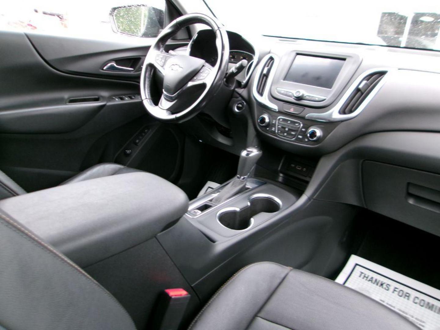 2020 BLACK CHEVROLET EQUINOX LT (3GNAXKEV3LL) with an 1.5L engine, Automatic transmission, located at 501 E. Columbia St., Springfield, OH, 45503, (800) 262-7122, 39.925262, -83.801796 - MIDNIGHT EDITION * JET BLACK LEATHER APPOINTED SEATING * WHEELS, 19'' GLOSS BLACK ALUMINUM * GRILLE, BLACK SURROUND * DARK FINISH FOG LAMP BEZEL SURROUND * MIRROR, INSIDE REARVIEW AUTO DIMMING * MIRRORS, DRIVER AUTO-DIMMING W/TURN SIGNAL INDICATORS * MEMORY SETTINGS DRI - Photo#15