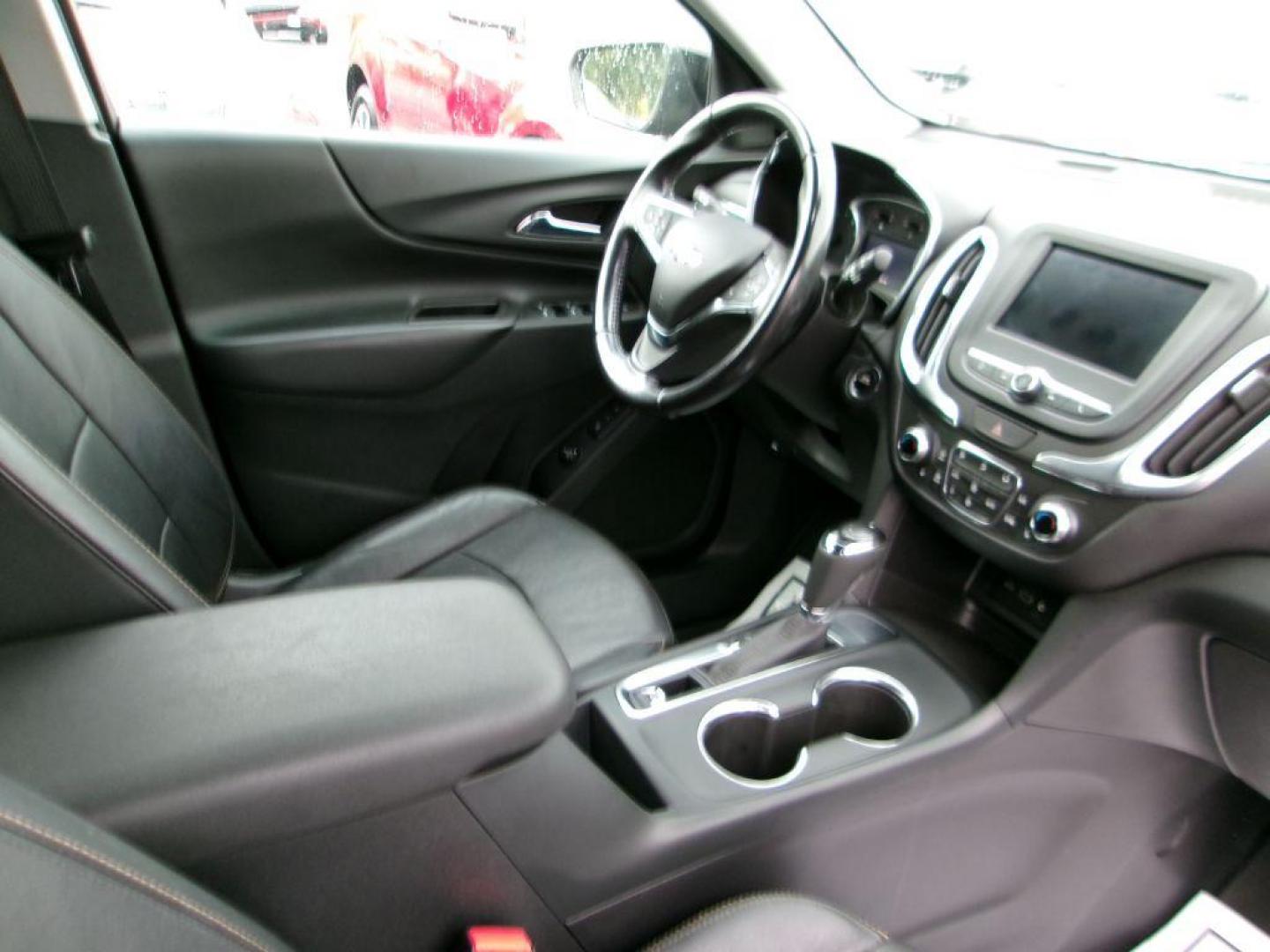 2020 BLACK CHEVROLET EQUINOX LT (3GNAXKEV3LL) with an 1.5L engine, Automatic transmission, located at 501 E. Columbia St., Springfield, OH, 45503, (800) 262-7122, 39.925262, -83.801796 - MIDNIGHT EDITION * JET BLACK LEATHER APPOINTED SEATING * WHEELS, 19'' GLOSS BLACK ALUMINUM * GRILLE, BLACK SURROUND * DARK FINISH FOG LAMP BEZEL SURROUND * MIRROR, INSIDE REARVIEW AUTO DIMMING * MIRRORS, DRIVER AUTO-DIMMING W/TURN SIGNAL INDICATORS * MEMORY SETTINGS DRI - Photo#17