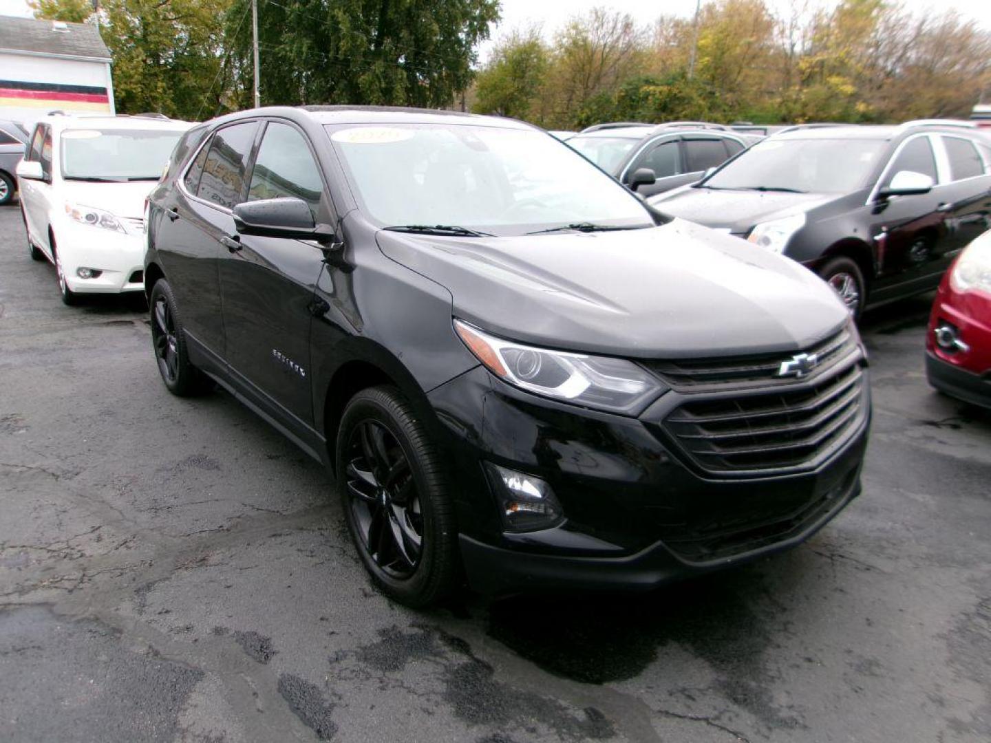 2020 BLACK CHEVROLET EQUINOX LT (3GNAXKEV3LL) with an 1.5L engine, Automatic transmission, located at 501 E. Columbia St., Springfield, OH, 45503, (800) 262-7122, 39.925262, -83.801796 - MIDNIGHT EDITION * JET BLACK LEATHER APPOINTED SEATING * WHEELS, 19'' GLOSS BLACK ALUMINUM * GRILLE, BLACK SURROUND * DARK FINISH FOG LAMP BEZEL SURROUND * MIRROR, INSIDE REARVIEW AUTO DIMMING * MIRRORS, DRIVER AUTO-DIMMING W/TURN SIGNAL INDICATORS * MEMORY SETTINGS DRI - Photo#1