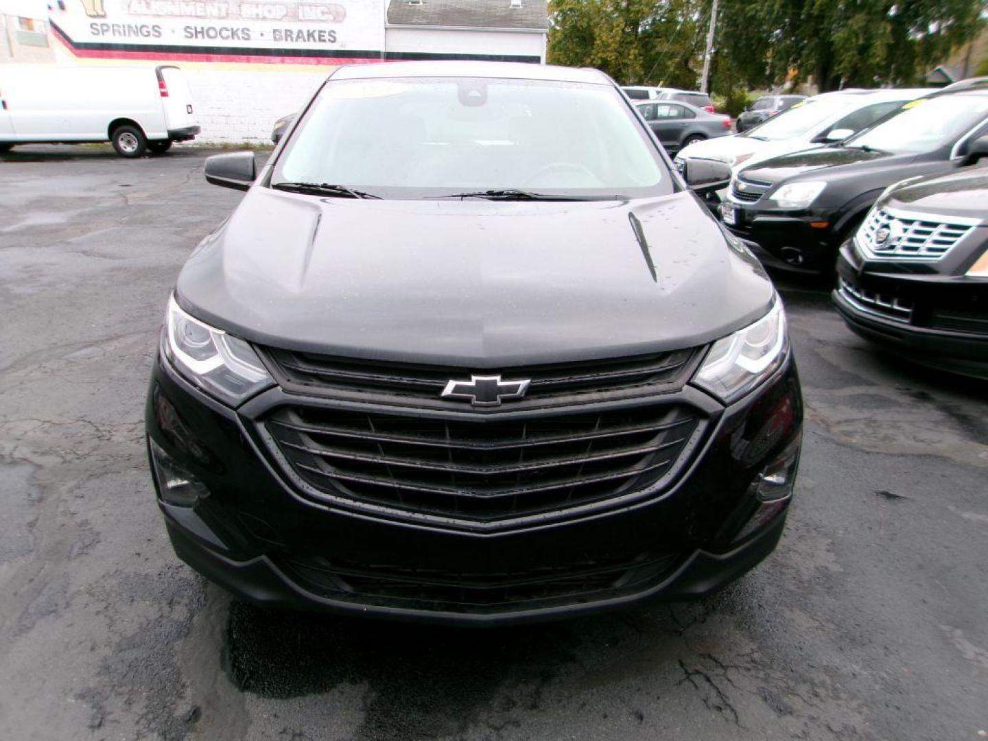 2020 BLACK CHEVROLET EQUINOX LT (3GNAXKEV3LL) with an 1.5L engine, Automatic transmission, located at 501 E. Columbia St., Springfield, OH, 45503, (800) 262-7122, 39.925262, -83.801796 - MIDNIGHT EDITION * JET BLACK LEATHER APPOINTED SEATING * WHEELS, 19'' GLOSS BLACK ALUMINUM * GRILLE, BLACK SURROUND * DARK FINISH FOG LAMP BEZEL SURROUND * MIRROR, INSIDE REARVIEW AUTO DIMMING * MIRRORS, DRIVER AUTO-DIMMING W/TURN SIGNAL INDICATORS * MEMORY SETTINGS DRI - Photo#2