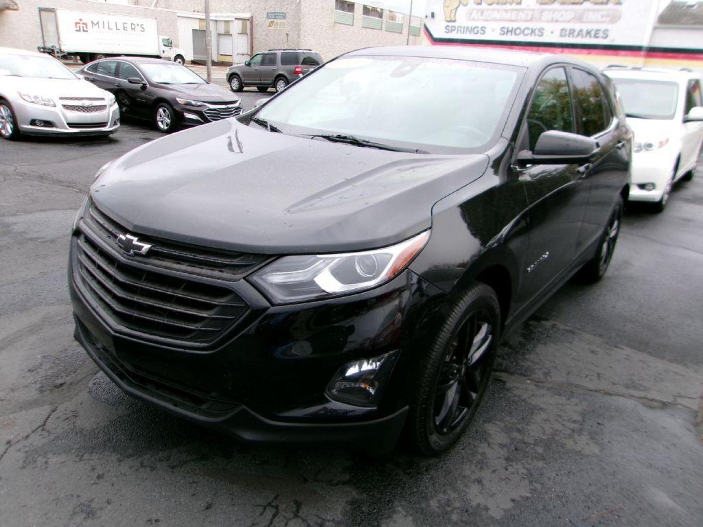 2020 BLACK CHEVROLET EQUINOX LT (3GNAXKEV3LL) with an 1.5L engine, Automatic transmission, located at 501 E. Columbia St., Springfield, OH, 45503, (800) 262-7122, 39.925262, -83.801796 - MIDNIGHT EDITION * JET BLACK LEATHER APPOINTED SEATING * WHEELS, 19'' GLOSS BLACK ALUMINUM * GRILLE, BLACK SURROUND * DARK FINISH FOG LAMP BEZEL SURROUND * MIRROR, INSIDE REARVIEW AUTO DIMMING * MIRRORS, DRIVER AUTO-DIMMING W/TURN SIGNAL INDICATORS * MEMORY SETTINGS DRI - Photo#3