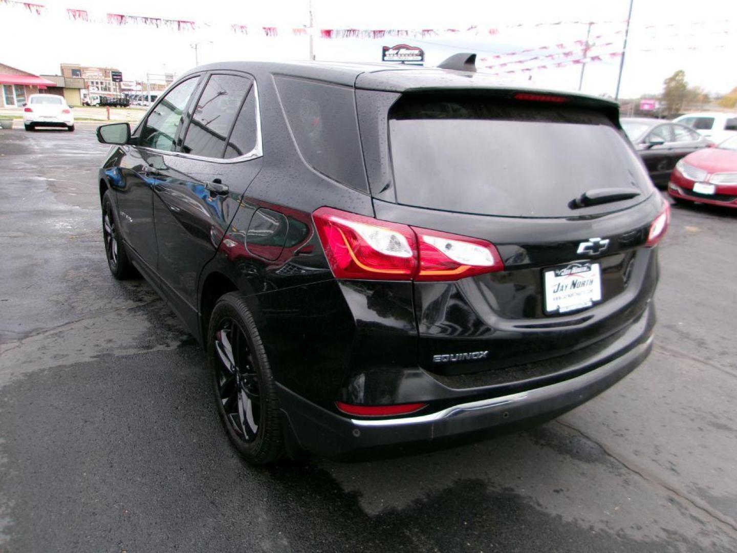 2020 BLACK CHEVROLET EQUINOX LT (3GNAXKEV3LL) with an 1.5L engine, Automatic transmission, located at 501 E. Columbia St., Springfield, OH, 45503, (800) 262-7122, 39.925262, -83.801796 - MIDNIGHT EDITION * JET BLACK LEATHER APPOINTED SEATING * WHEELS, 19'' GLOSS BLACK ALUMINUM * GRILLE, BLACK SURROUND * DARK FINISH FOG LAMP BEZEL SURROUND * MIRROR, INSIDE REARVIEW AUTO DIMMING * MIRRORS, DRIVER AUTO-DIMMING W/TURN SIGNAL INDICATORS * MEMORY SETTINGS DRI - Photo#4