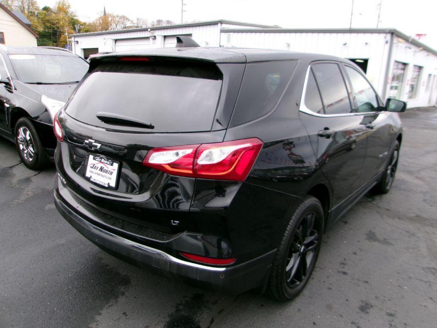 2020 BLACK CHEVROLET EQUINOX LT (3GNAXKEV3LL) with an 1.5L engine, Automatic transmission, located at 501 E. Columbia St., Springfield, OH, 45503, (800) 262-7122, 39.925262, -83.801796 - MIDNIGHT EDITION * JET BLACK LEATHER APPOINTED SEATING * WHEELS, 19'' GLOSS BLACK ALUMINUM * GRILLE, BLACK SURROUND * DARK FINISH FOG LAMP BEZEL SURROUND * MIRROR, INSIDE REARVIEW AUTO DIMMING * MIRRORS, DRIVER AUTO-DIMMING W/TURN SIGNAL INDICATORS * MEMORY SETTINGS DRI - Photo#5