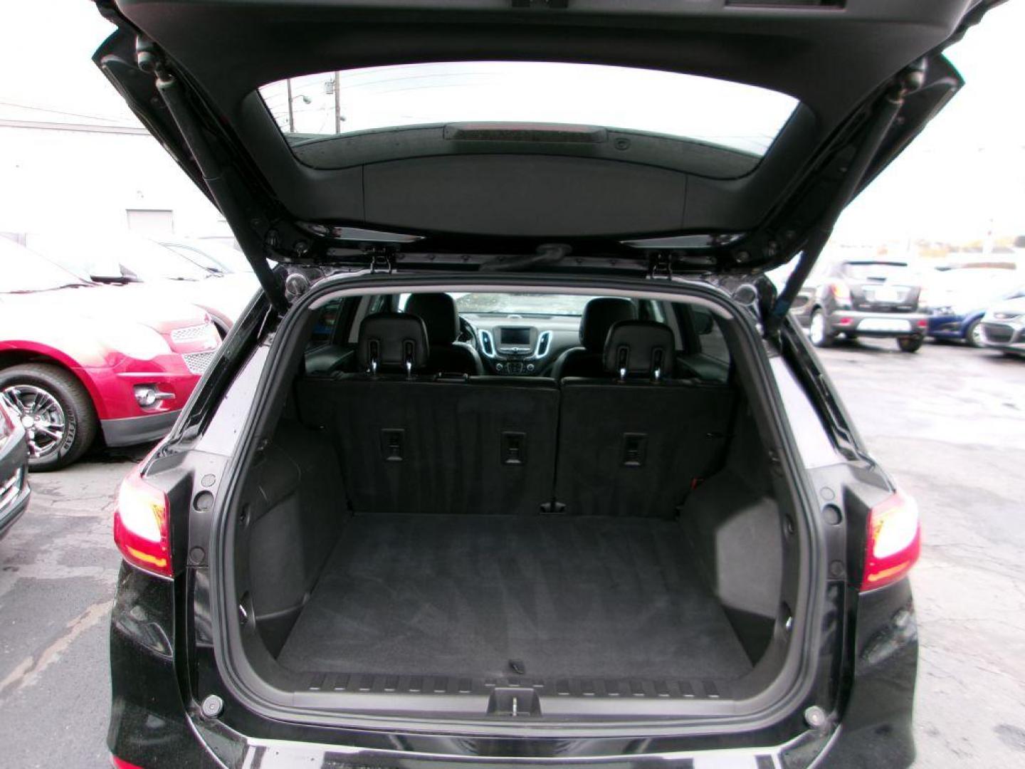 2020 BLACK CHEVROLET EQUINOX LT (3GNAXKEV3LL) with an 1.5L engine, Automatic transmission, located at 501 E. Columbia St., Springfield, OH, 45503, (800) 262-7122, 39.925262, -83.801796 - MIDNIGHT EDITION * JET BLACK LEATHER APPOINTED SEATING * WHEELS, 19'' GLOSS BLACK ALUMINUM * GRILLE, BLACK SURROUND * DARK FINISH FOG LAMP BEZEL SURROUND * MIRROR, INSIDE REARVIEW AUTO DIMMING * MIRRORS, DRIVER AUTO-DIMMING W/TURN SIGNAL INDICATORS * MEMORY SETTINGS DRI - Photo#6