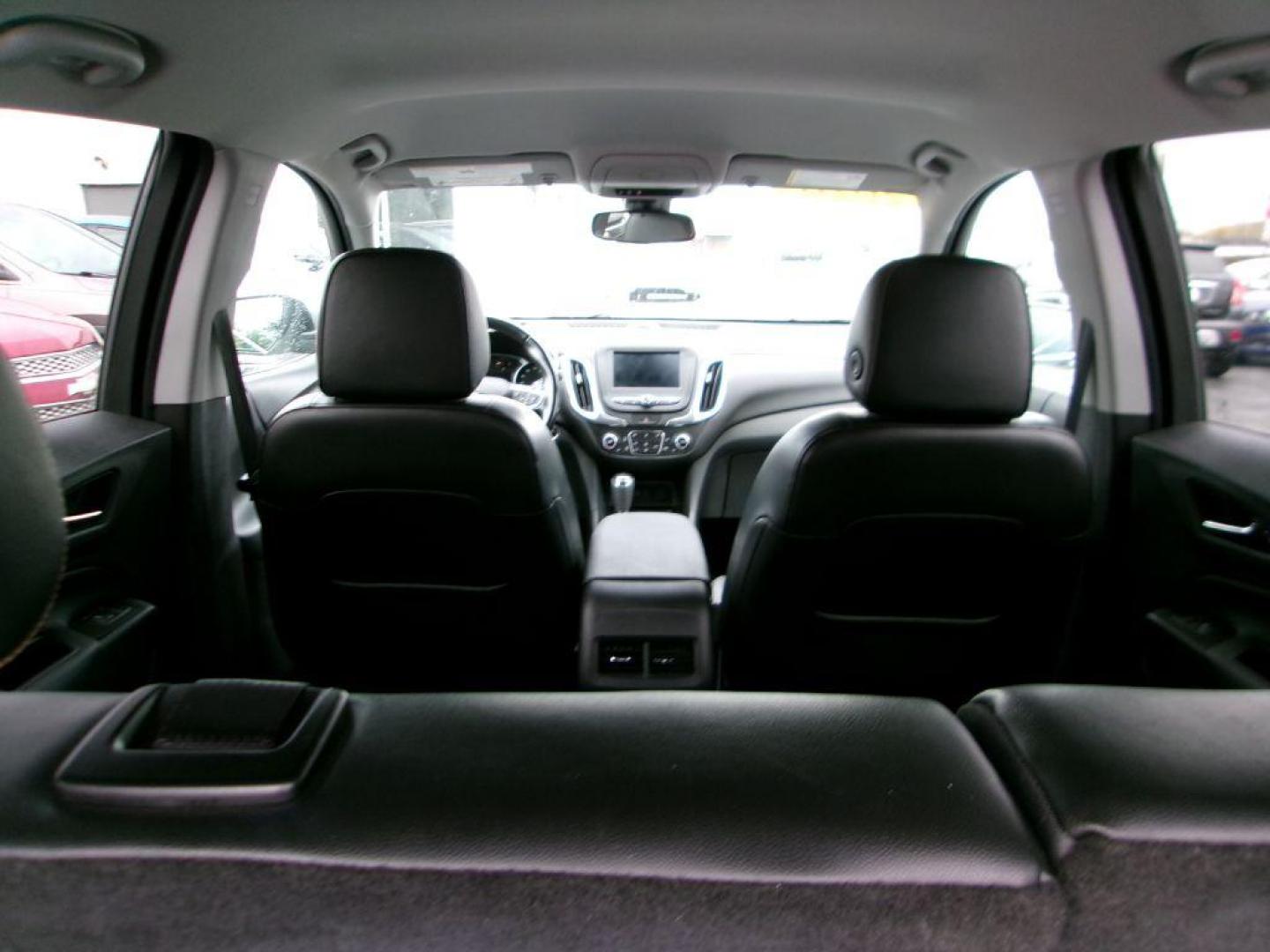 2020 BLACK CHEVROLET EQUINOX LT (3GNAXKEV3LL) with an 1.5L engine, Automatic transmission, located at 501 E. Columbia St., Springfield, OH, 45503, (800) 262-7122, 39.925262, -83.801796 - MIDNIGHT EDITION * JET BLACK LEATHER APPOINTED SEATING * WHEELS, 19'' GLOSS BLACK ALUMINUM * GRILLE, BLACK SURROUND * DARK FINISH FOG LAMP BEZEL SURROUND * MIRROR, INSIDE REARVIEW AUTO DIMMING * MIRRORS, DRIVER AUTO-DIMMING W/TURN SIGNAL INDICATORS * MEMORY SETTINGS DRI - Photo#7