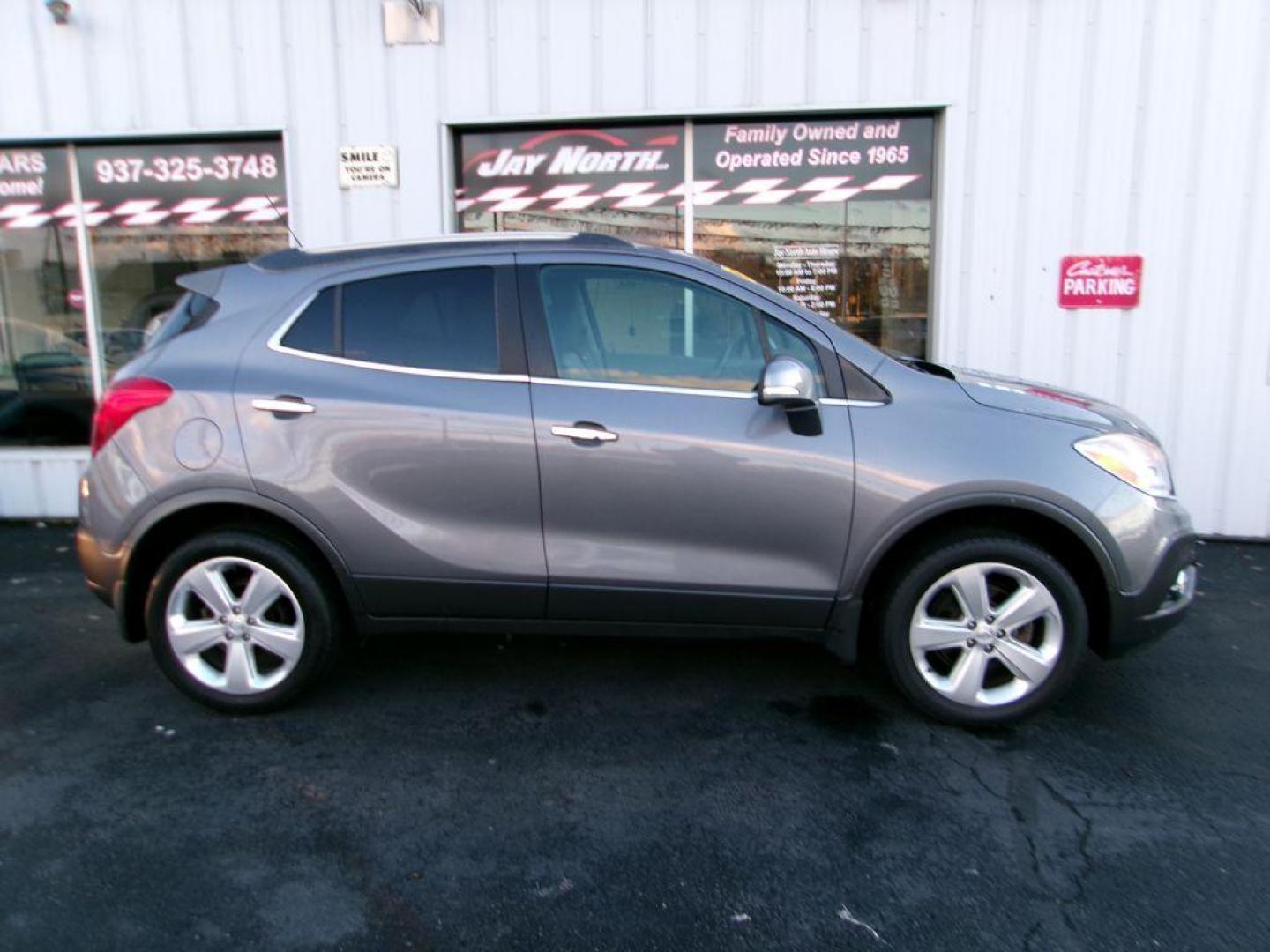 2015 GRAY BUICK ENCORE PREMIUM (KL4CJHSB2FB) with an 1.4L engine, Automatic transmission, located at 501 E. Columbia St., Springfield, OH, 45503, (800) 262-7122, 39.925262, -83.801796 - *** 1 Owner *** 30 Service Records *** Premium *** All Wheel Drive *** Serviced and Detailed *** Back Up Camera *** Heated Leather Seating *** Bose Audio *** Jay North Auto has offered hand picked vehicles since 1965! Our customer's enjoy a NO pressure buying experience with a small town feel. - Photo#0