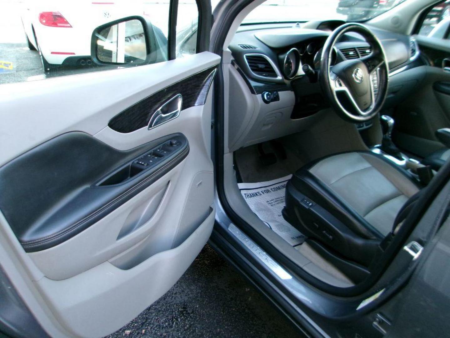 2015 GRAY BUICK ENCORE PREMIUM (KL4CJHSB2FB) with an 1.4L engine, Automatic transmission, located at 501 E. Columbia St., Springfield, OH, 45503, (800) 262-7122, 39.925262, -83.801796 - *** 1 Owner *** 30 Service Records *** Premium *** All Wheel Drive *** Serviced and Detailed *** Back Up Camera *** Heated Leather Seating *** Bose Audio *** Jay North Auto has offered hand picked vehicles since 1965! Our customer's enjoy a NO pressure buying experience with a small town feel. - Photo#12
