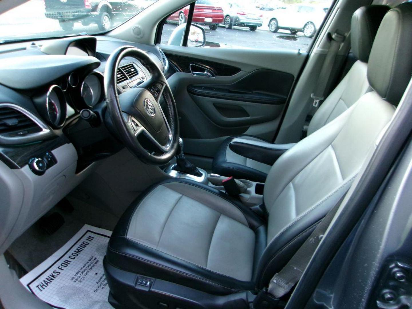 2015 GRAY BUICK ENCORE PREMIUM (KL4CJHSB2FB) with an 1.4L engine, Automatic transmission, located at 501 E. Columbia St., Springfield, OH, 45503, (800) 262-7122, 39.925262, -83.801796 - *** 1 Owner *** 30 Service Records *** Premium *** All Wheel Drive *** Serviced and Detailed *** Back Up Camera *** Heated Leather Seating *** Bose Audio *** Jay North Auto has offered hand picked vehicles since 1965! Our customer's enjoy a NO pressure buying experience with a small town feel. - Photo#13