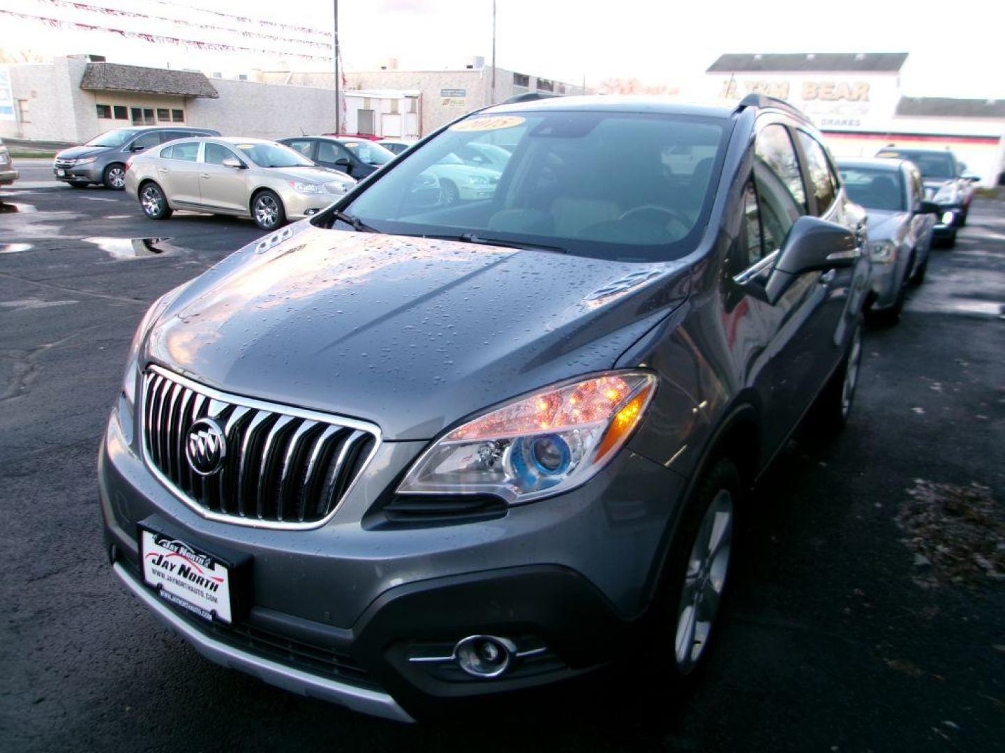 2015 GRAY BUICK ENCORE PREMIUM (KL4CJHSB2FB) with an 1.4L engine, Automatic transmission, located at 501 E. Columbia St., Springfield, OH, 45503, (800) 262-7122, 39.925262, -83.801796 - *** 1 Owner *** 30 Service Records *** Premium *** All Wheel Drive *** Serviced and Detailed *** Back Up Camera *** Heated Leather Seating *** Bose Audio *** Jay North Auto has offered hand picked vehicles since 1965! Our customer's enjoy a NO pressure buying experience with a small town feel. - Photo#3