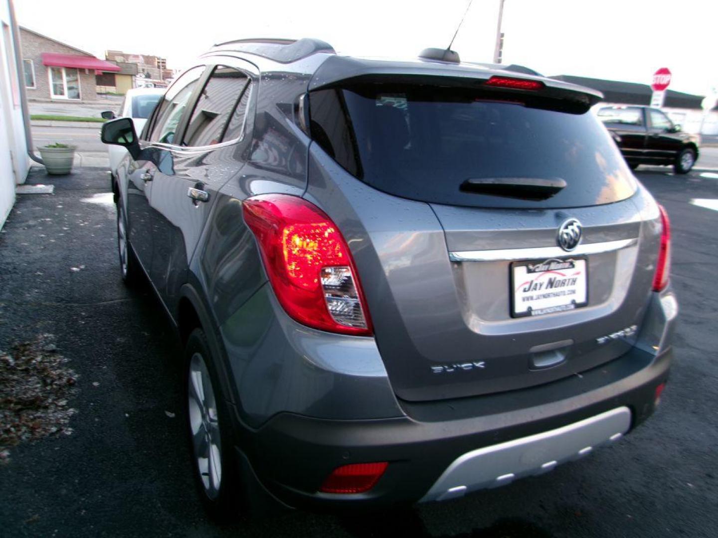 2015 GRAY BUICK ENCORE PREMIUM (KL4CJHSB2FB) with an 1.4L engine, Automatic transmission, located at 501 E. Columbia St., Springfield, OH, 45503, (800) 262-7122, 39.925262, -83.801796 - *** 1 Owner *** 30 Service Records *** Premium *** All Wheel Drive *** Serviced and Detailed *** Back Up Camera *** Heated Leather Seating *** Bose Audio *** Jay North Auto has offered hand picked vehicles since 1965! Our customer's enjoy a NO pressure buying experience with a small town feel. - Photo#4