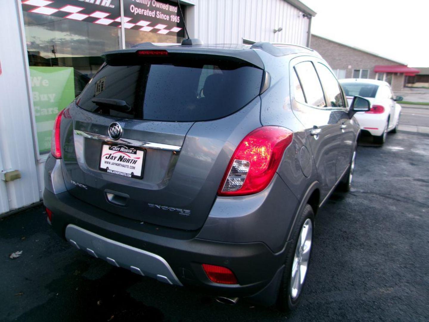 2015 GRAY BUICK ENCORE PREMIUM (KL4CJHSB2FB) with an 1.4L engine, Automatic transmission, located at 501 E. Columbia St., Springfield, OH, 45503, (800) 262-7122, 39.925262, -83.801796 - *** 1 Owner *** 30 Service Records *** Premium *** All Wheel Drive *** Serviced and Detailed *** Back Up Camera *** Heated Leather Seating *** Bose Audio *** Jay North Auto has offered hand picked vehicles since 1965! Our customer's enjoy a NO pressure buying experience with a small town feel. - Photo#6