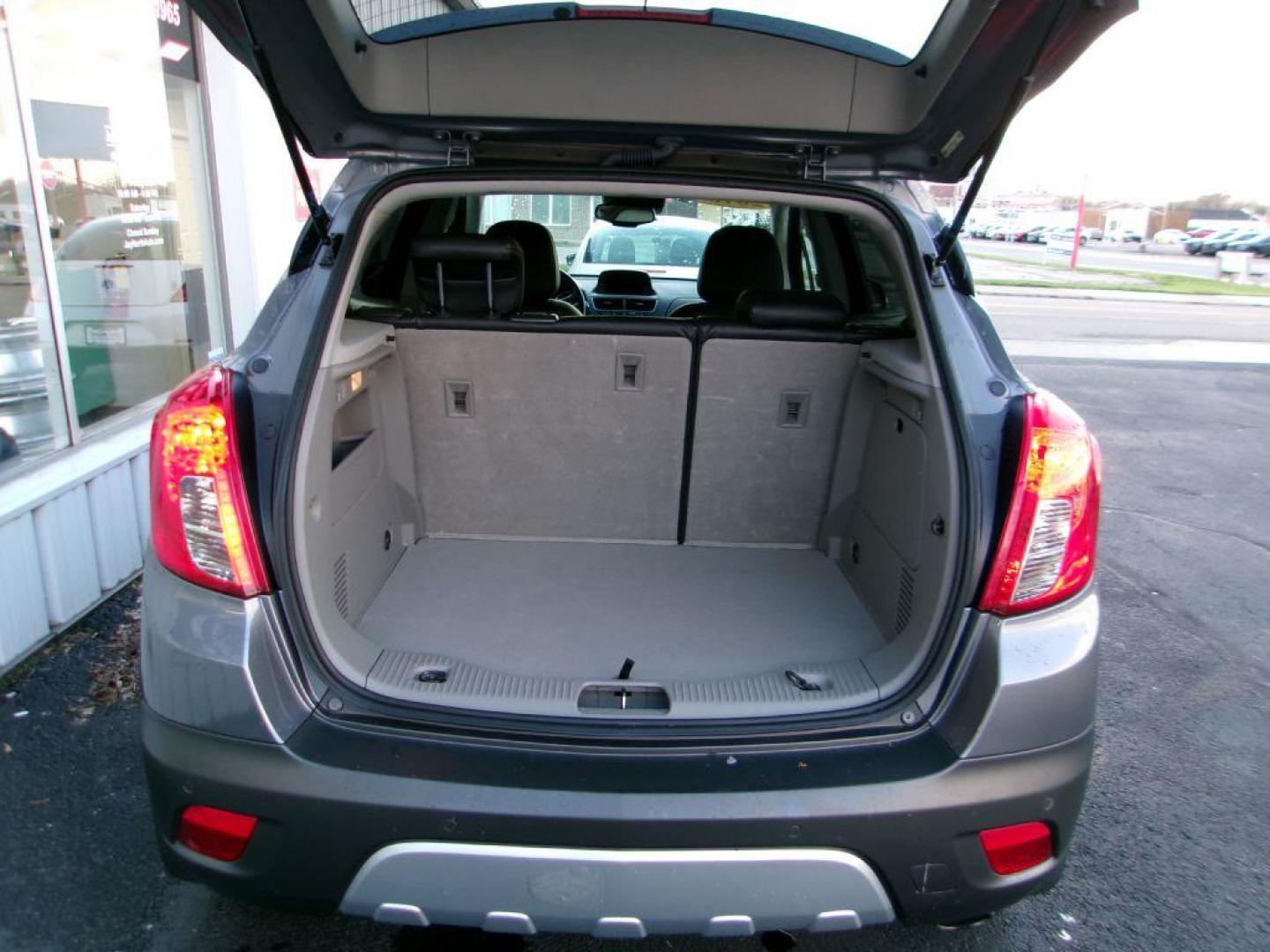 2015 GRAY BUICK ENCORE PREMIUM (KL4CJHSB2FB) with an 1.4L engine, Automatic transmission, located at 501 E. Columbia St., Springfield, OH, 45503, (800) 262-7122, 39.925262, -83.801796 - *** 1 Owner *** 30 Service Records *** Premium *** All Wheel Drive *** Serviced and Detailed *** Back Up Camera *** Heated Leather Seating *** Bose Audio *** Jay North Auto has offered hand picked vehicles since 1965! Our customer's enjoy a NO pressure buying experience with a small town feel. - Photo#7