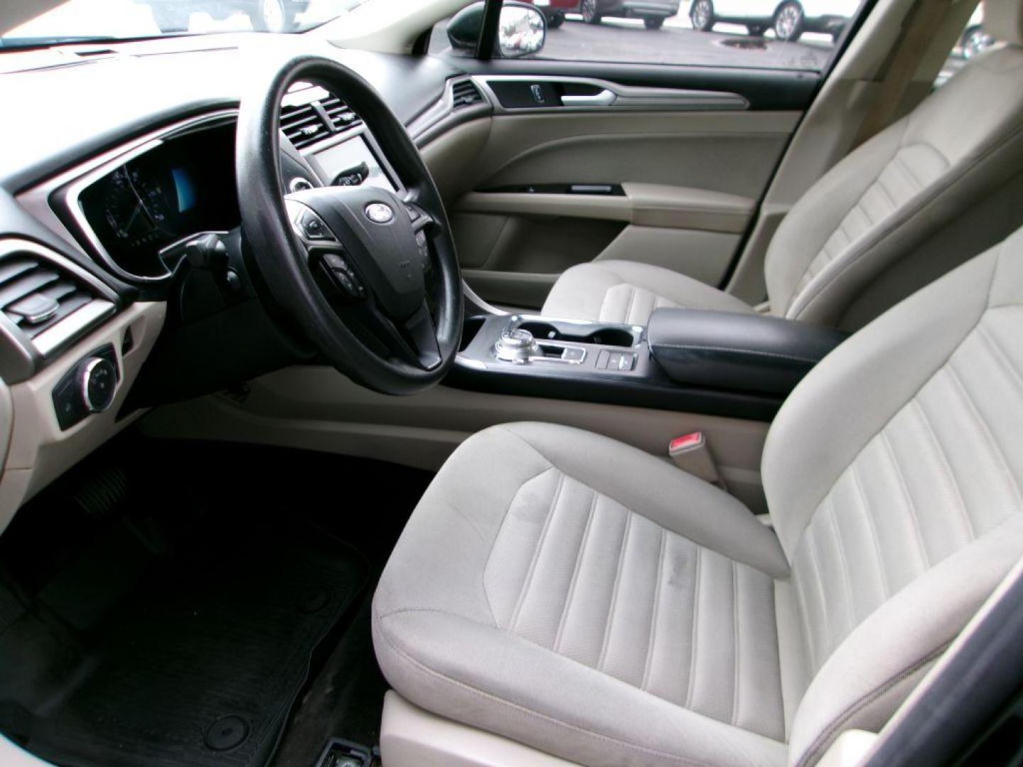 2017 BLACK FORD FUSION SE HYBRID (3FA6P0LU1HR) with an 2.0L engine, Continuously Variable transmission, located at 501 E. Columbia St., Springfield, OH, 45503, (800) 262-7122, 39.925262, -83.801796 - ***Hybrid***SE***New Brakes***Back-up Camera***SYNC 3***Serviced and Detailed*** Jay North Auto has offered hand picked vehicles since 1965! Our customer's enjoy a NO pressure buying experience with a small town feel. All of our vehicles get fully inspected and detailed. We are a preferred dea - Photo#8