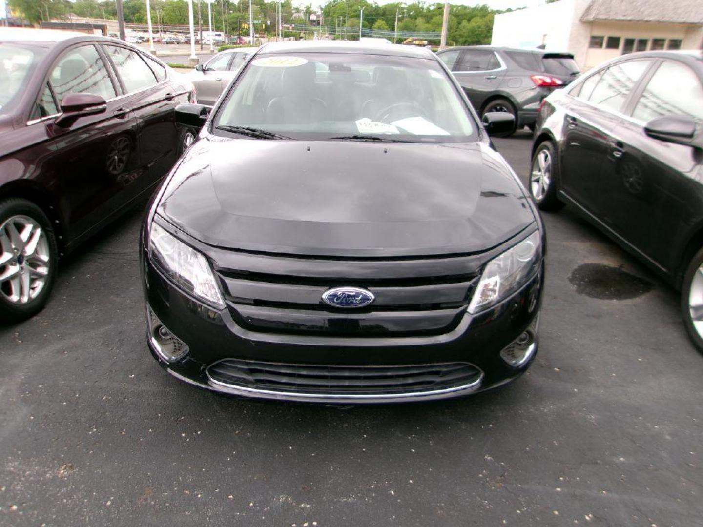 2012 BLACK FORD FUSION SEL (3FAHP0JA4CR) with an 2.5L engine, Automatic transmission, located at 501 E. Columbia St., Springfield, OH, 45503, (800) 262-7122, 39.925262, -83.801796 - *** SEL *** FWD *** Serviced and Detailed *** Sony Audio *** Moonroof *** Leather *** Jay North Auto has offered hand picked vehicles since 1965! Our customer's enjoy a NO pressure buying experience with a small town feel. All of our vehicles get fully inspected and detailed. We are a preferred - Photo#1