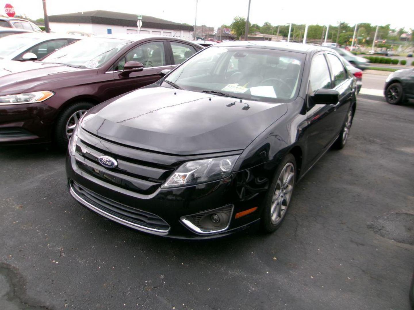 2012 BLACK FORD FUSION SEL (3FAHP0JA4CR) with an 2.5L engine, Automatic transmission, located at 501 E. Columbia St., Springfield, OH, 45503, (800) 262-7122, 39.925262, -83.801796 - *** SEL *** FWD *** Serviced and Detailed *** Sony Audio *** Moonroof *** Leather *** Jay North Auto has offered hand picked vehicles since 1965! Our customer's enjoy a NO pressure buying experience with a small town feel. All of our vehicles get fully inspected and detailed. We are a preferred - Photo#3