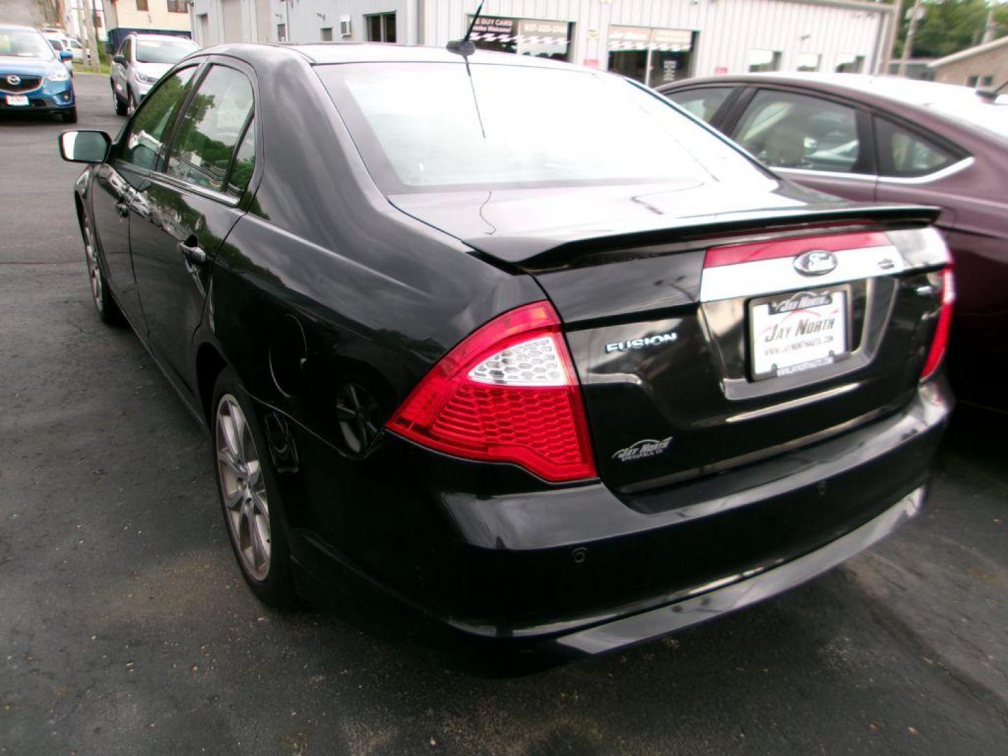 2012 BLACK FORD FUSION SEL (3FAHP0JA4CR) with an 2.5L engine, Automatic transmission, located at 501 E. Columbia St., Springfield, OH, 45503, (800) 262-7122, 39.925262, -83.801796 - *** SEL *** FWD *** Serviced and Detailed *** Sony Audio *** Moonroof *** Leather *** Jay North Auto has offered hand picked vehicles since 1965! Our customer's enjoy a NO pressure buying experience with a small town feel. All of our vehicles get fully inspected and detailed. We are a preferred - Photo#6