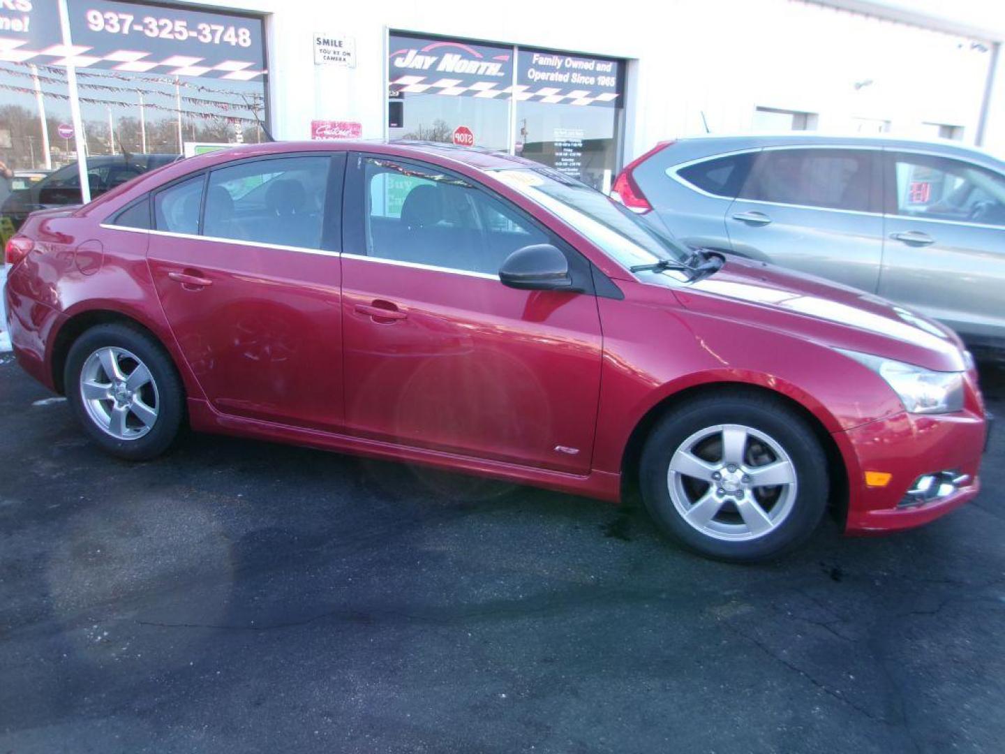 2014 RED CHEVROLET CRUZE LT (1G1PC5SB0E7) with an 1.4L engine, Automatic transmission, located at 501 E. Columbia St., Springfield, OH, 45503, (800) 262-7122, 39.925262, -83.801796 - Photo#0