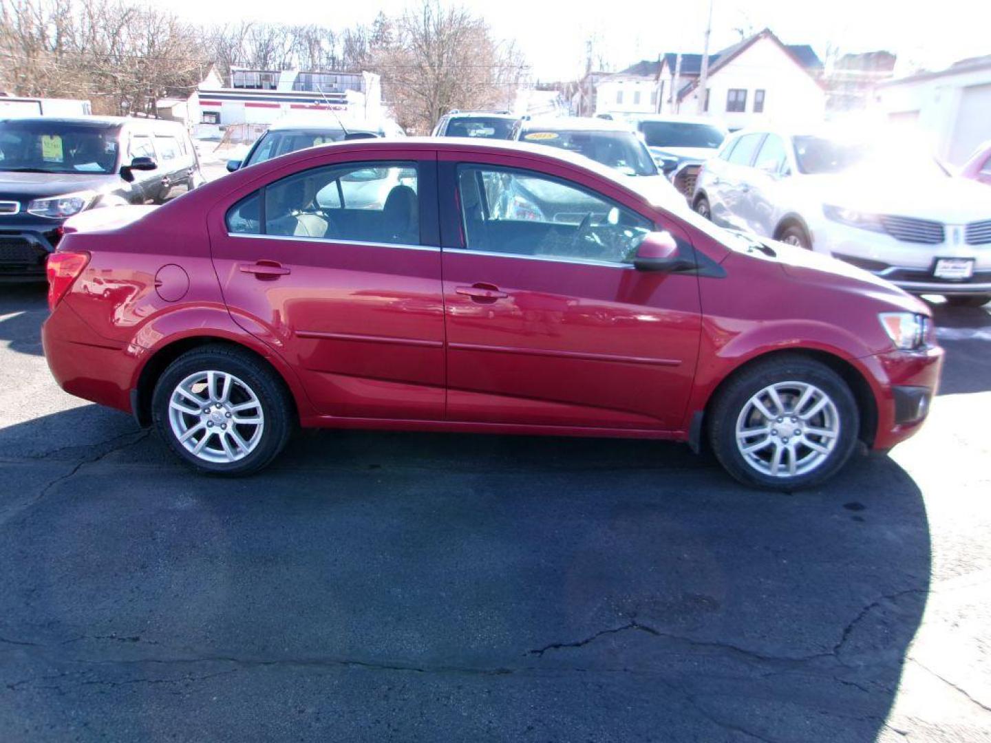 2016 RED CHEVROLET SONIC LT (1G1JC5SH9G4) with an 1.8L engine, Automatic transmission, located at 501 E. Columbia St., Springfield, OH, 45503, (800) 262-7122, 39.925262, -83.801796 - Photo#0
