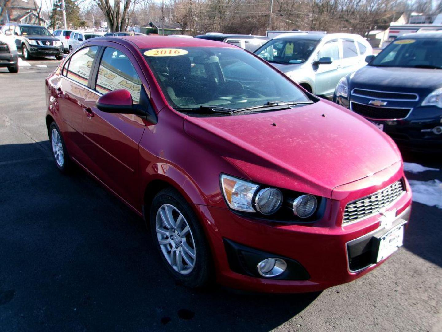 2016 RED CHEVROLET SONIC LT (1G1JC5SH9G4) with an 1.8L engine, Automatic transmission, located at 501 E. Columbia St., Springfield, OH, 45503, (800) 262-7122, 39.925262, -83.801796 - Photo#1