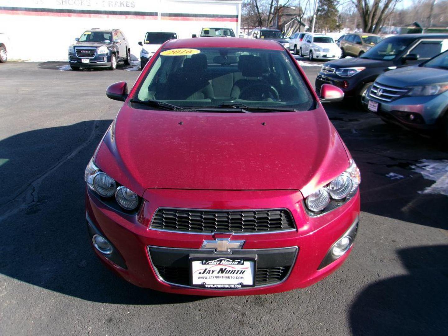 2016 RED CHEVROLET SONIC LT (1G1JC5SH9G4) with an 1.8L engine, Automatic transmission, located at 501 E. Columbia St., Springfield, OH, 45503, (800) 262-7122, 39.925262, -83.801796 - Photo#2