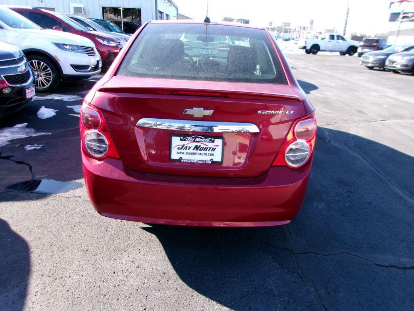 2016 RED CHEVROLET SONIC LT (1G1JC5SH9G4) with an 1.8L engine, Automatic transmission, located at 501 E. Columbia St., Springfield, OH, 45503, (800) 262-7122, 39.925262, -83.801796 - Photo#5