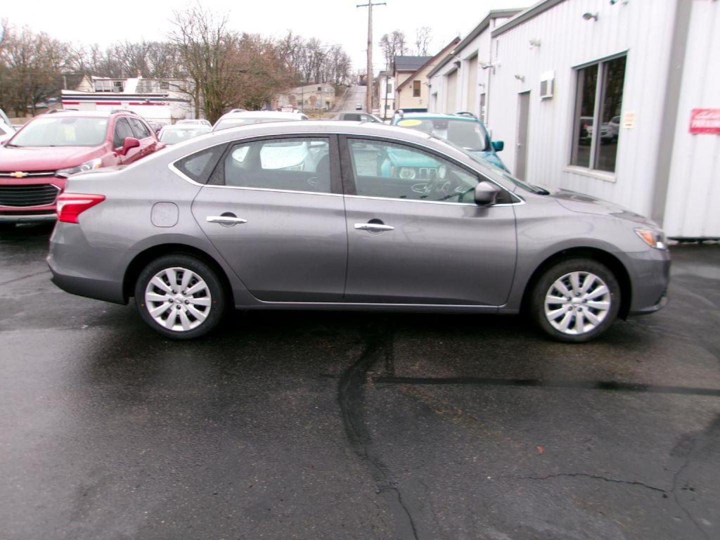 2019 GRAY NISSAN SENTRA S (3N1AB7APXKY) with an 1.8L engine, Continuously Variable transmission, located at 501 E. Columbia St., Springfield, OH, 45503, (800) 262-7122, 39.925262, -83.801796 - Photo#0