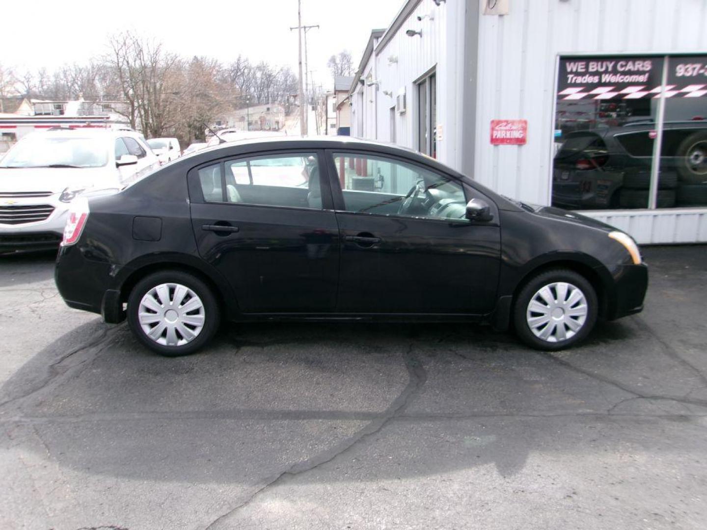 2009 BLACK NISSAN SENTRA 2.0 (3N1AB61E49L) with an 2.0L engine, Continuously Variable transmission, located at 501 E. Columbia St., Springfield, OH, 45503, (800) 262-7122, 39.925262, -83.801796 - Photo#0