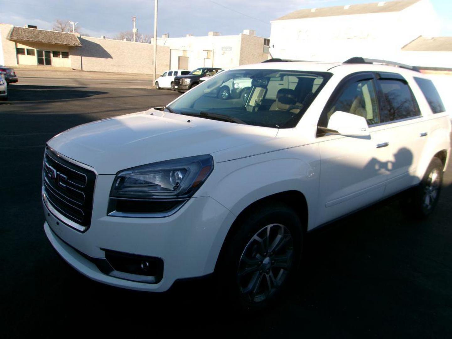 2014 WHITE GMC ACADIA SLT-1 (1GKKVRKD1EJ) with an 3.6L engine, Automatic transmission, located at 501 E. Columbia St., Springfield, OH, 45503, (800) 262-7122, 39.925262, -83.801796 - *** New Tires *** Leather *** Moonroof *** Remote Start *** LOADED *** Serviced and Detailed *** 34 Service Records on CarFax *** Jay North Auto has offered hand picked vehicles since 1965! Our customer's enjoy a NO pressure buying experience with a small town feel. All of our vehicles get fully - Photo#2
