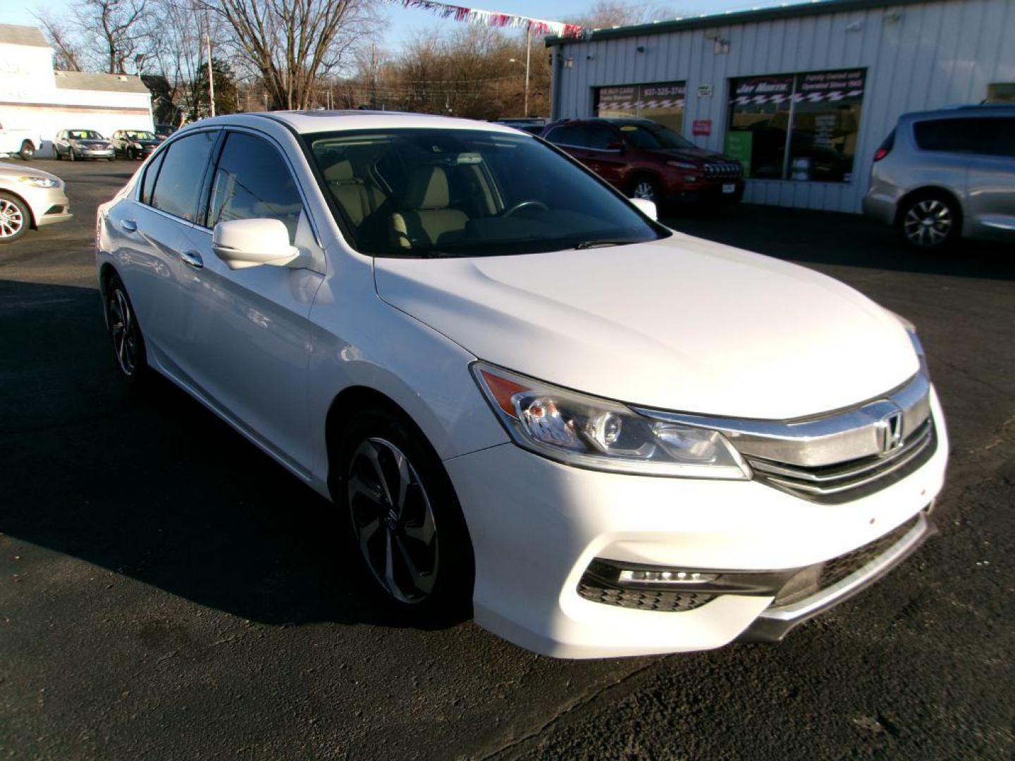 2017 WHITE HONDA ACCORD EXL (1HGCR3F0XHA) with an 3.5L engine, Automatic transmission, located at 501 E. Columbia St., Springfield, OH, 45503, (800) 262-7122, 39.925262, -83.801796 - *** New Tires *** EXL *** Navigation *** Moonroof *** Leather *** Serviced and Detailed *** Premium Audio *** NICE *** Jay North Auto has offered hand picked vehicles since 1965! Our customer's enjoy a NO pressure buying experience with a small town feel. All of our vehicles get fully inspected - Photo#2