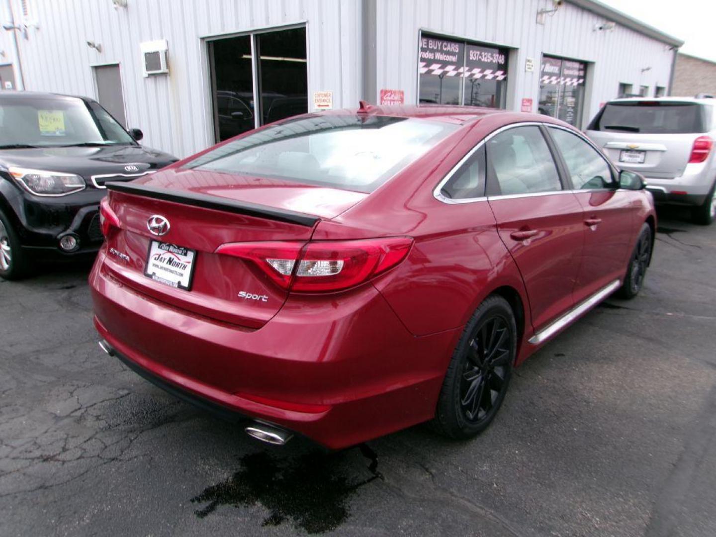 2015 RED HYUNDAI SONATA SPORT (5NPE34AF4FH) with an 2.4L engine, Automatic transmission, located at 501 E. Columbia St., Springfield, OH, 45503, (800) 262-7122, 39.925262, -83.801796 - Photo#3