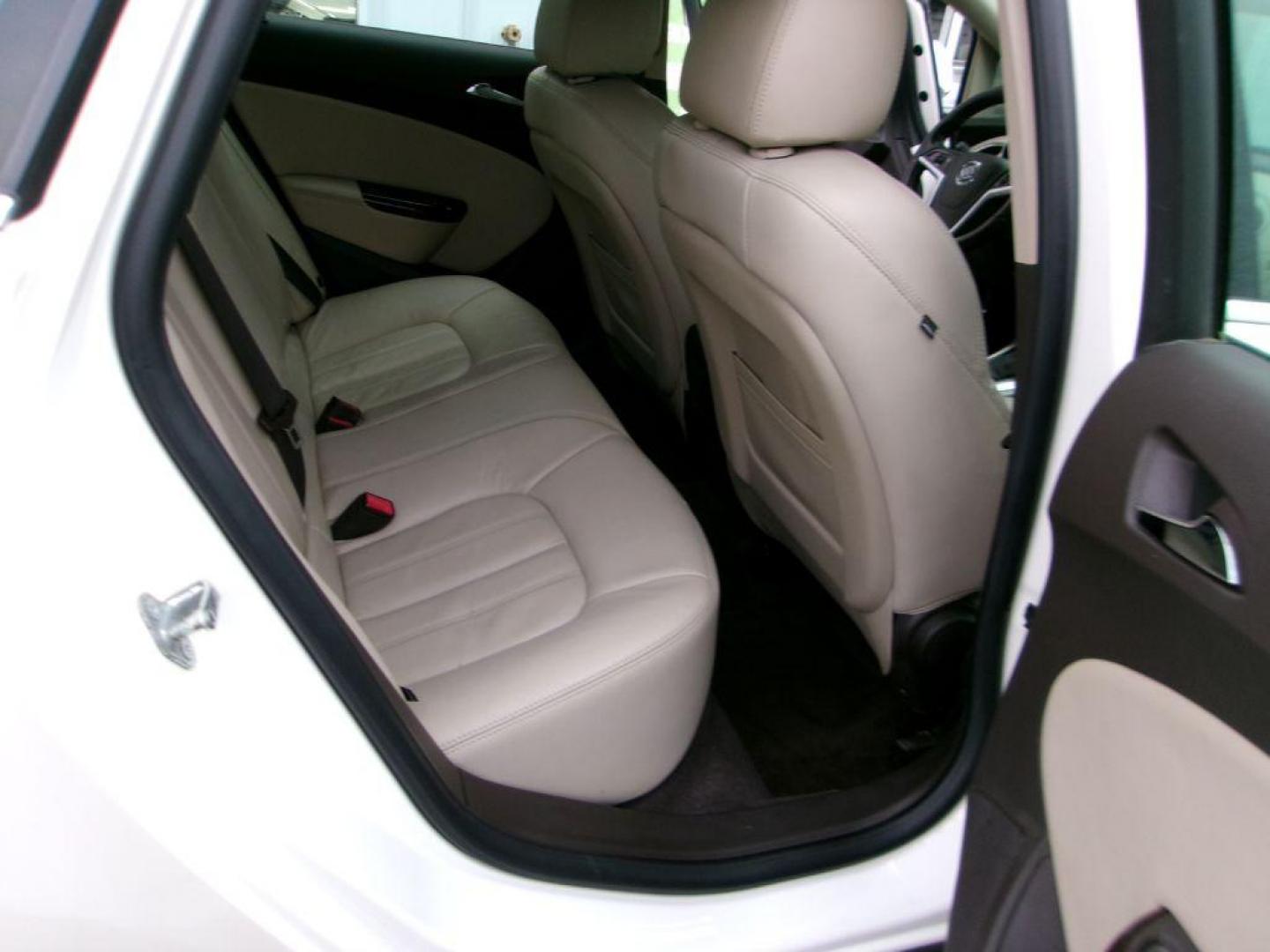 2013 WHITE BUICK VERANO LEATHER GROUP (1G4PS5SK3D4) with an 2.4L engine, Automatic transmission, located at 501 E. Columbia St., Springfield, OH, 45503, (800) 262-7122, 39.925262, -83.801796 - *** 1 Owner w/ Clean CarFax and 23 Service Records *** New Timing *** Leather *** Moonroof *** Remote Start *** Heated Seats *** Bose Audio *** Blind Spot Does Not Work *** Jay North Auto has offered hand picked vehicles since 1965! Our customer's enjoy a NO pressure buying experience with a sma - Photo#13