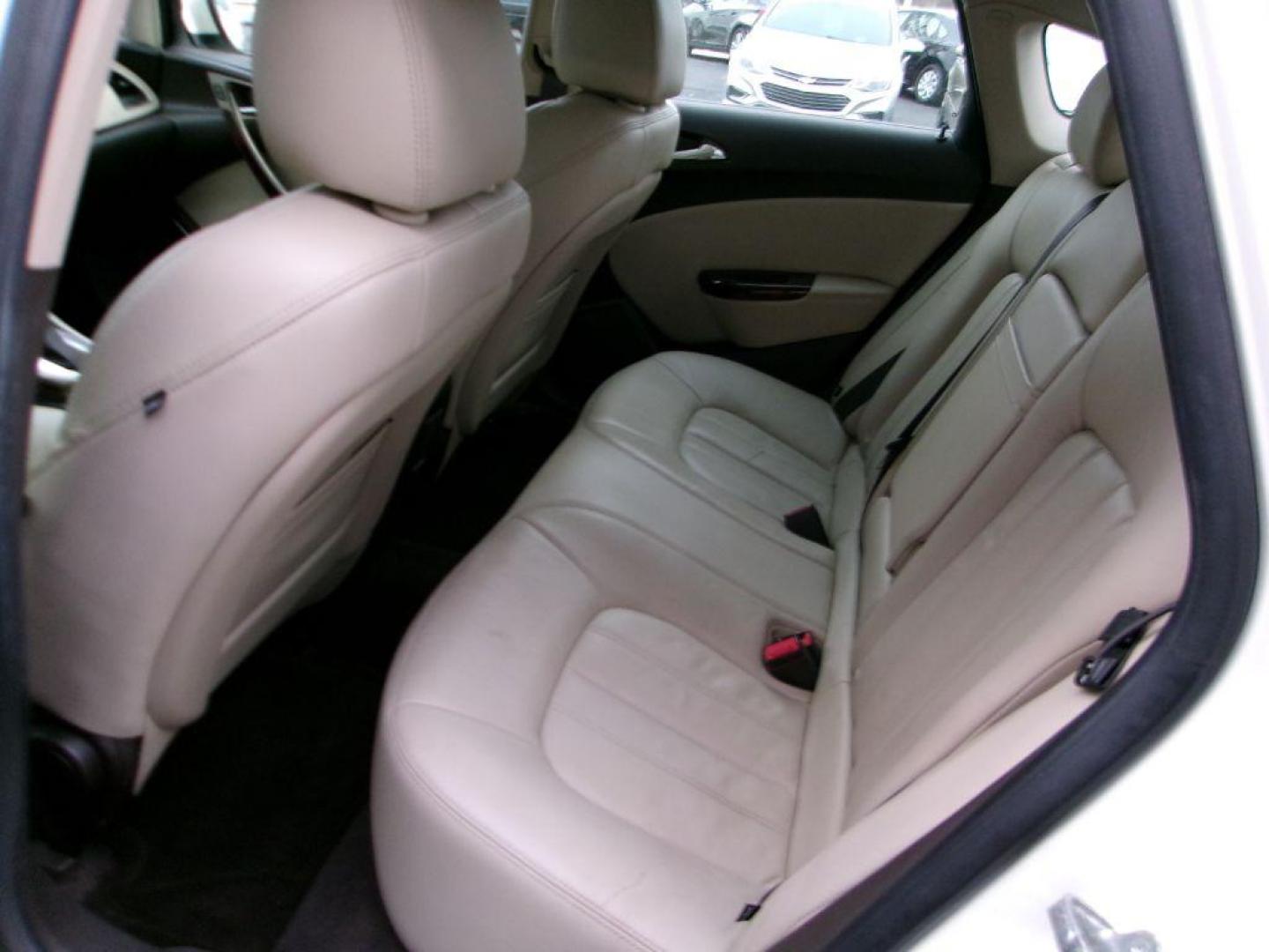2013 WHITE BUICK VERANO LEATHER GROUP (1G4PS5SK3D4) with an 2.4L engine, Automatic transmission, located at 501 E. Columbia St., Springfield, OH, 45503, (800) 262-7122, 39.925262, -83.801796 - *** 1 Owner w/ Clean CarFax and 23 Service Records *** New Timing *** Leather *** Moonroof *** Remote Start *** Heated Seats *** Bose Audio *** Blind Spot Does Not Work *** Jay North Auto has offered hand picked vehicles since 1965! Our customer's enjoy a NO pressure buying experience with a sma - Photo#7