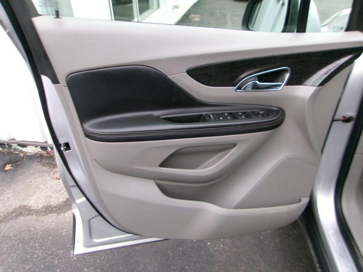 2015 SILVER BUICK ENCORE (KL4CJASB5FB) with an 1.4L engine, Automatic transmission, located at 501 E. Columbia St., Springfield, OH, 45503, (800) 262-7122, 39.925262, -83.801796 - *** Clean CarFax *** New Turbo *** Serviced and Detailed *** FWD *** Jay North Auto has offered hand picked vehicles since 1965! Our customer's enjoy a NO pressure buying experience with a small town feel. All of our vehicles get fully inspected and detailed. We are a preferred dealer for many - Photo#9