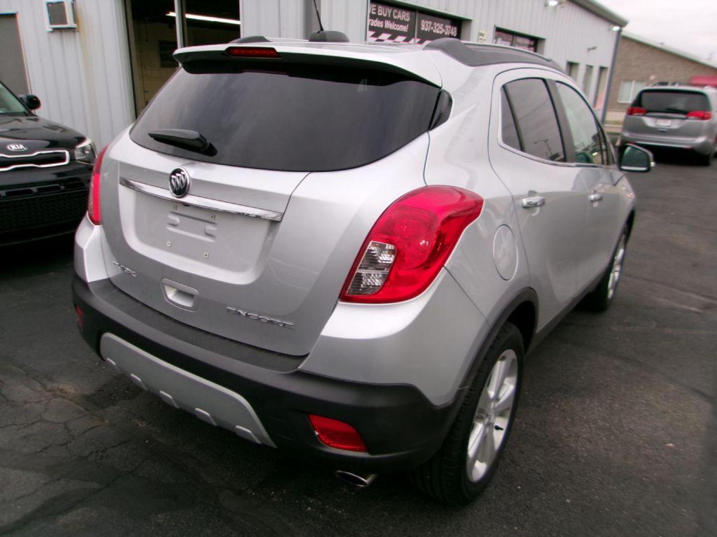 2015 SILVER BUICK ENCORE (KL4CJASB5FB) with an 1.4L engine, Automatic transmission, located at 501 E. Columbia St., Springfield, OH, 45503, (800) 262-7122, 39.925262, -83.801796 - *** Clean CarFax *** New Turbo *** Serviced and Detailed *** FWD *** Jay North Auto has offered hand picked vehicles since 1965! Our customer's enjoy a NO pressure buying experience with a small town feel. All of our vehicles get fully inspected and detailed. We are a preferred dealer for many - Photo#6