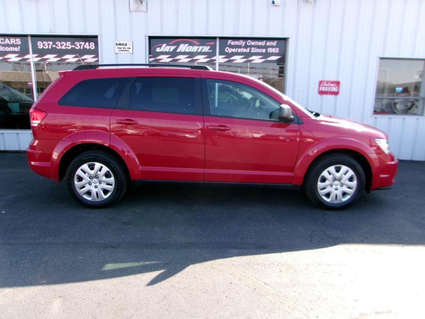 2018 RED DODGE JOURNEY SE (3C4PDCAB5JT) with an 2.4L engine, Automatic transmission, located at 501 E. Columbia St., Springfield, OH, 45503, (800) 262-7122, 39.925262, -83.801796 - ***Regular Oil Changes on Carfax***CLEAN***SE***3rd Row Seating***Serviced and Detailed*** Jay North Auto has offered hand picked vehicles since 1965! Our customer's enjoy a NO pressure buying experience with a small town feel. All of our vehicles get fully inspected and detailed. We are a prefe - Photo#0
