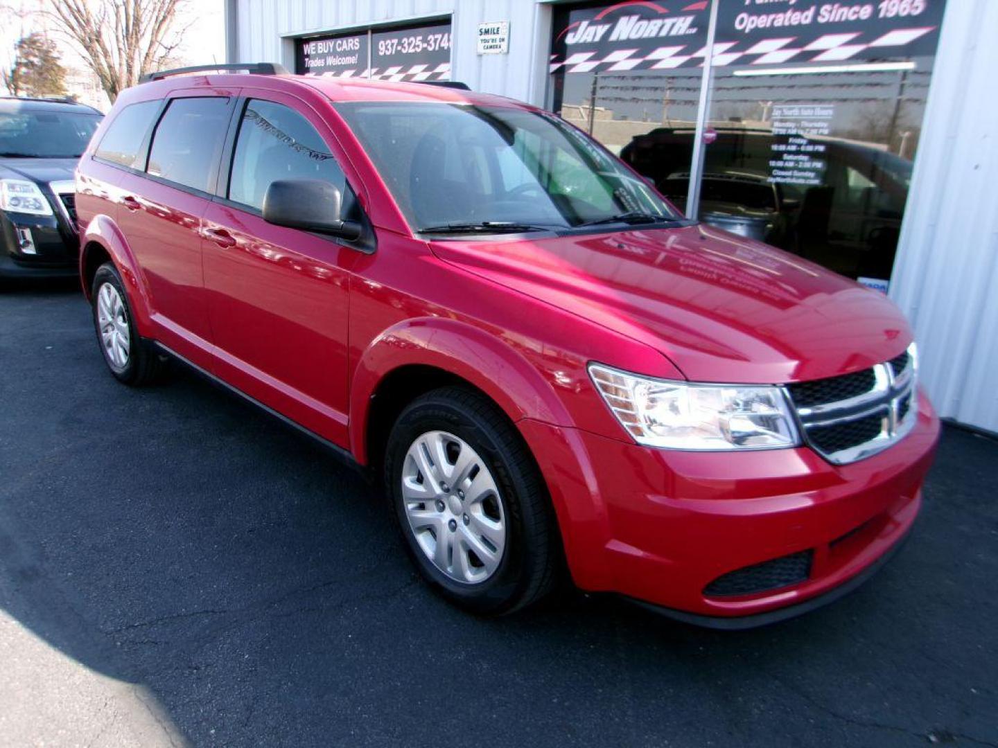 2018 RED DODGE JOURNEY SE (3C4PDCAB5JT) with an 2.4L engine, Automatic transmission, located at 501 E. Columbia St., Springfield, OH, 45503, (800) 262-7122, 39.925262, -83.801796 - ***Regular Oil Changes on Carfax***CLEAN***SE***3rd Row Seating***Serviced and Detailed*** Jay North Auto has offered hand picked vehicles since 1965! Our customer's enjoy a NO pressure buying experience with a small town feel. All of our vehicles get fully inspected and detailed. We are a prefe - Photo#1