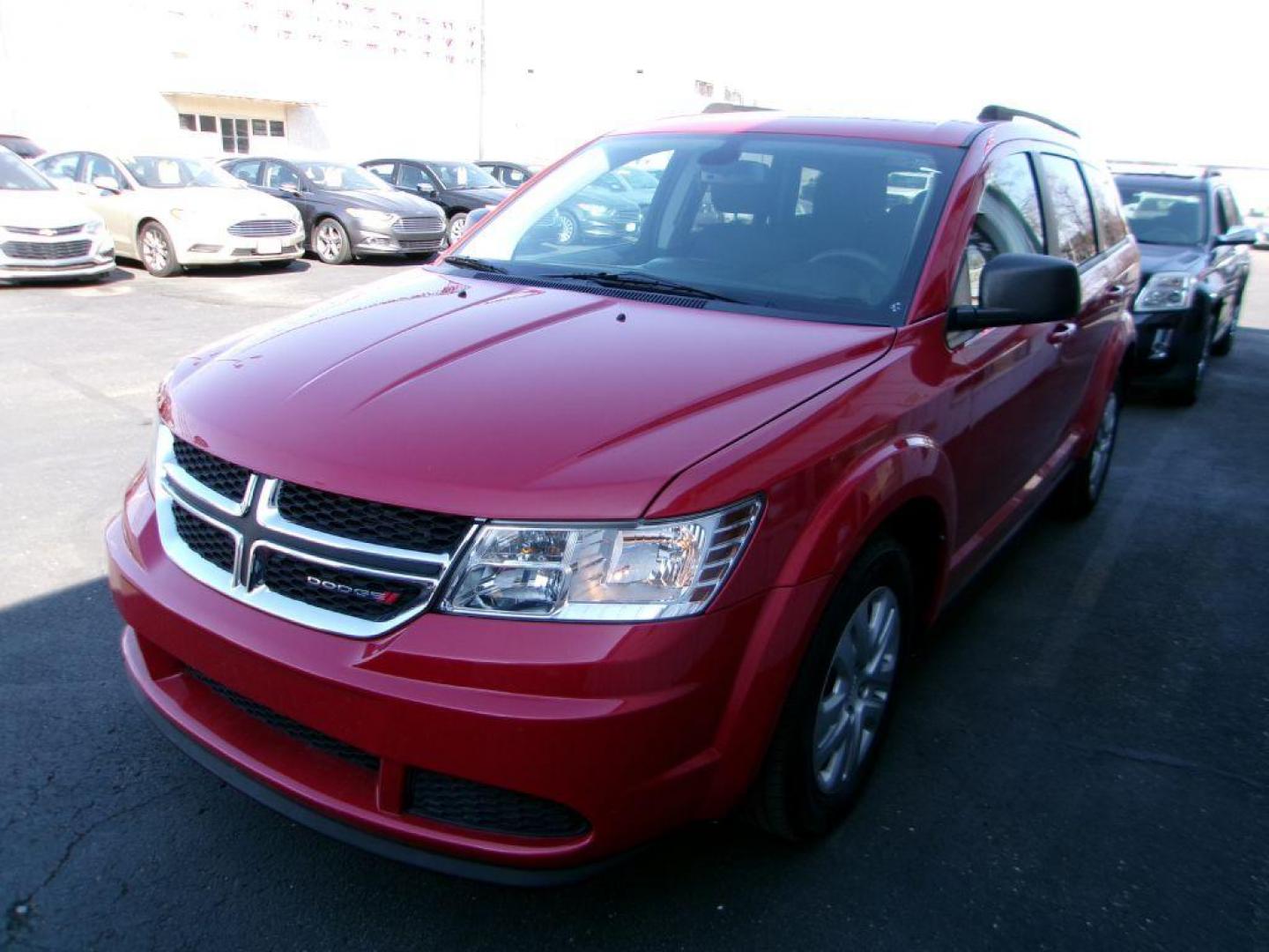 2018 RED DODGE JOURNEY SE (3C4PDCAB5JT) with an 2.4L engine, Automatic transmission, located at 501 E. Columbia St., Springfield, OH, 45503, (800) 262-7122, 39.925262, -83.801796 - ***Regular Oil Changes on Carfax***CLEAN***SE***3rd Row Seating***Serviced and Detailed*** Jay North Auto has offered hand picked vehicles since 1965! Our customer's enjoy a NO pressure buying experience with a small town feel. All of our vehicles get fully inspected and detailed. We are a prefe - Photo#3
