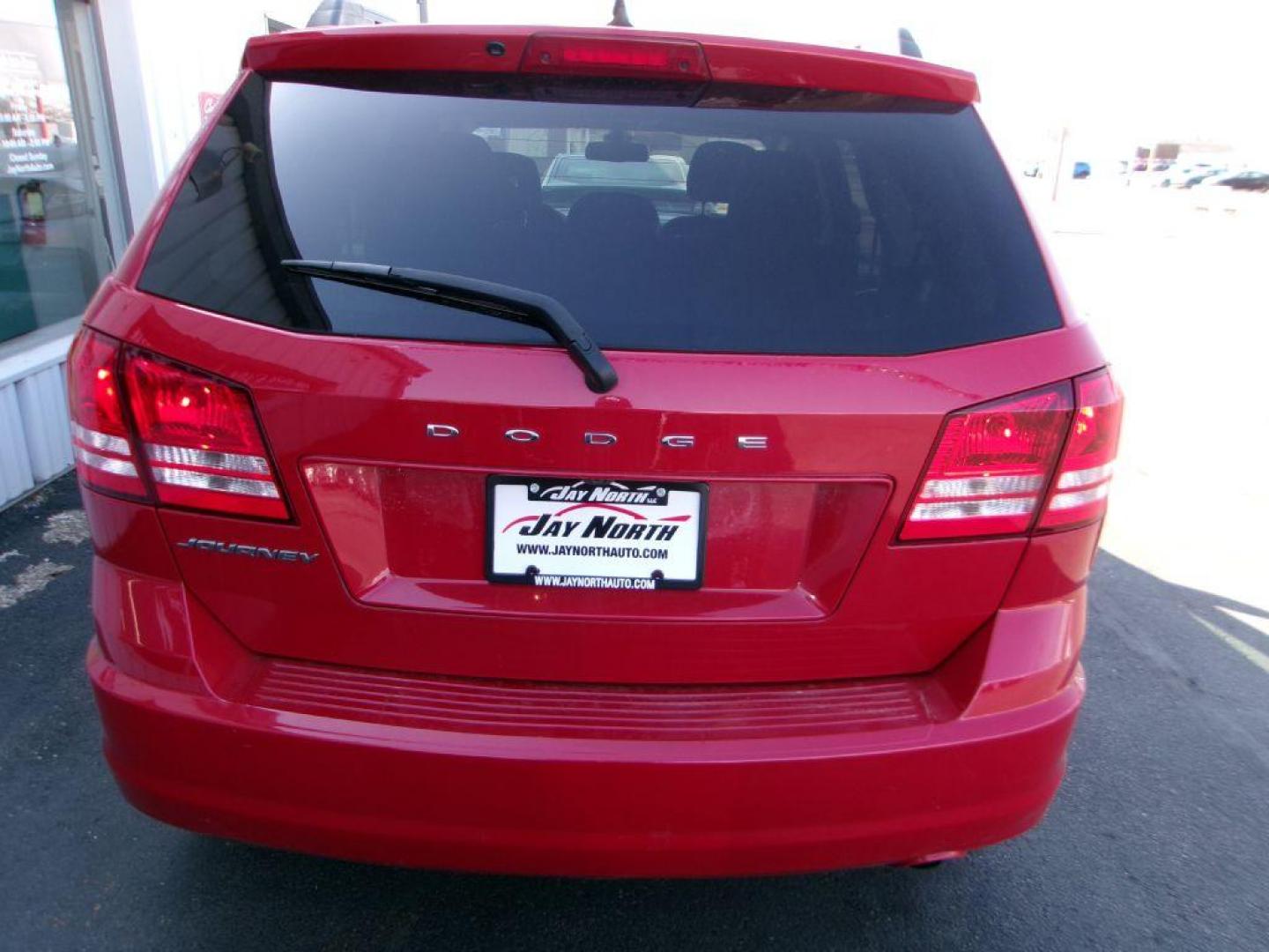 2018 RED DODGE JOURNEY SE (3C4PDCAB5JT) with an 2.4L engine, Automatic transmission, located at 501 E. Columbia St., Springfield, OH, 45503, (800) 262-7122, 39.925262, -83.801796 - ***Regular Oil Changes on Carfax***CLEAN***SE***3rd Row Seating***Serviced and Detailed*** Jay North Auto has offered hand picked vehicles since 1965! Our customer's enjoy a NO pressure buying experience with a small town feel. All of our vehicles get fully inspected and detailed. We are a prefe - Photo#5